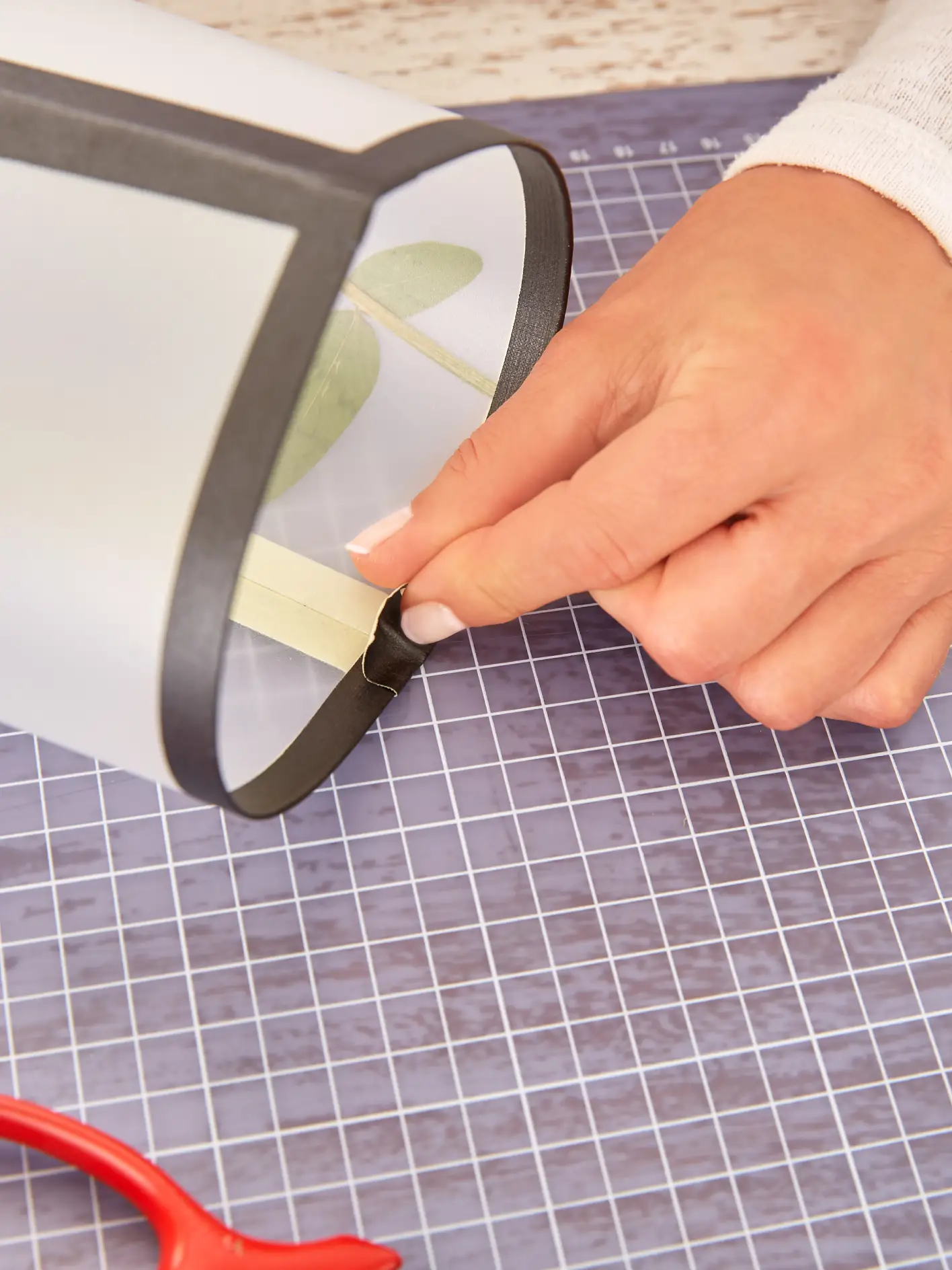Open the sheets and tidy up the edge of the tesa extra power