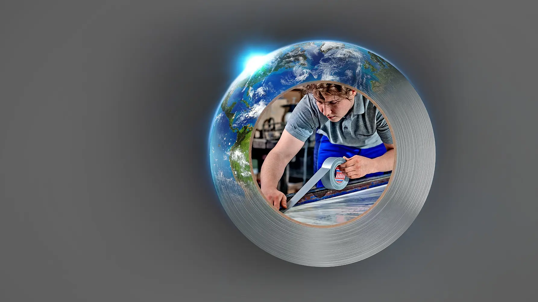 A man is working with a blue tool on a piece of material, surrounded by a metal circular frame secured with tesa tape. In the background, partially visible, is a view of Earth from space. The overall theme blends technology and global perspective.