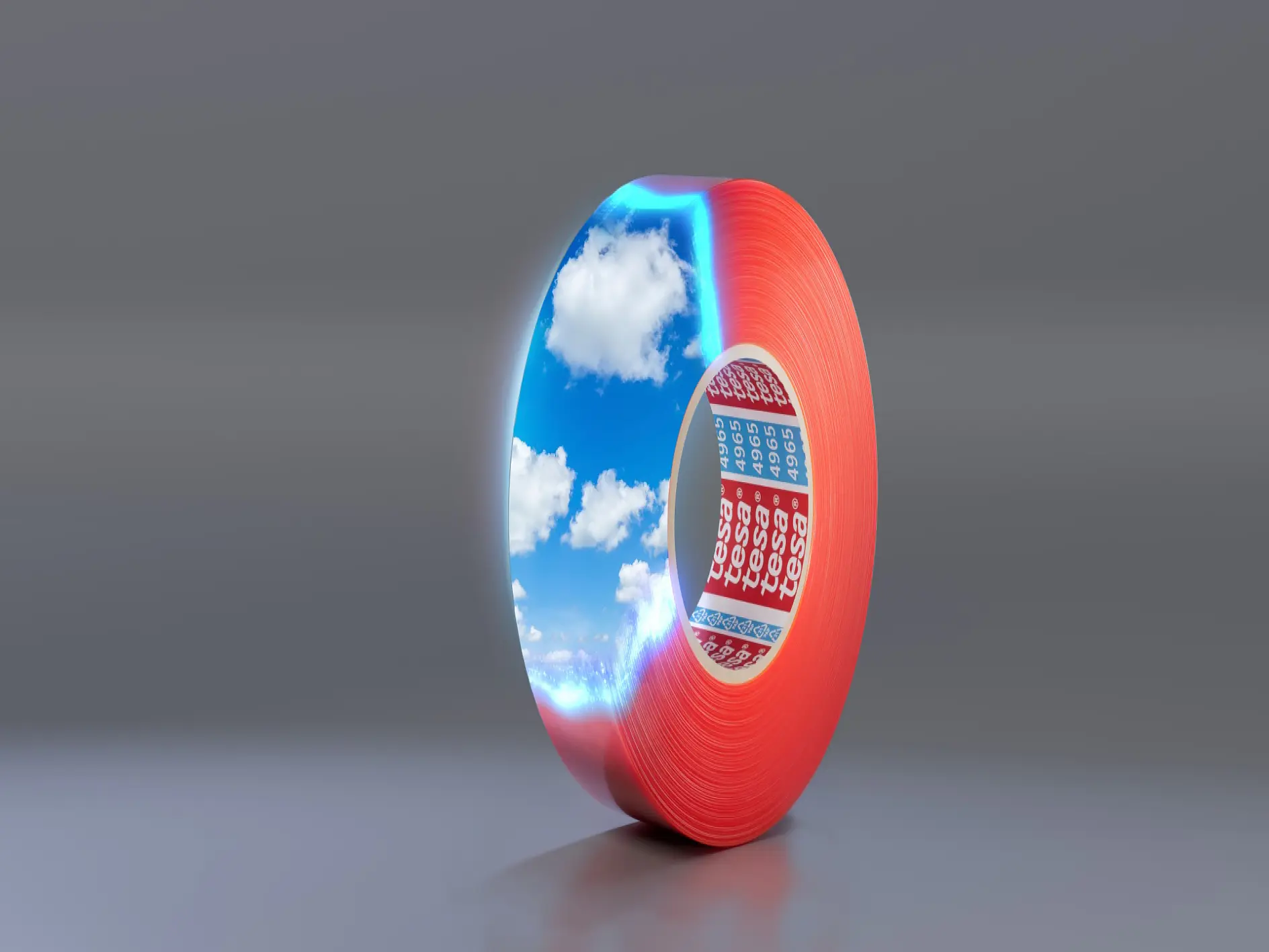 A roll of red tesa tape with reflective coating, showing a vivid sky with clouds on its surface. It is positioned upright on a smooth, gray background. (This text has been generated by AI)