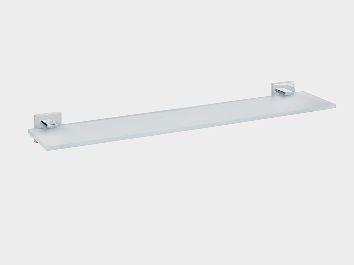 A rectangular glass shelf with metal brackets for wall mounting. The brackets are silver in color, and the glass is frosted. The shelf is positioned against a plain white background using tesa tape for added stability. (This text has been generated by AI)