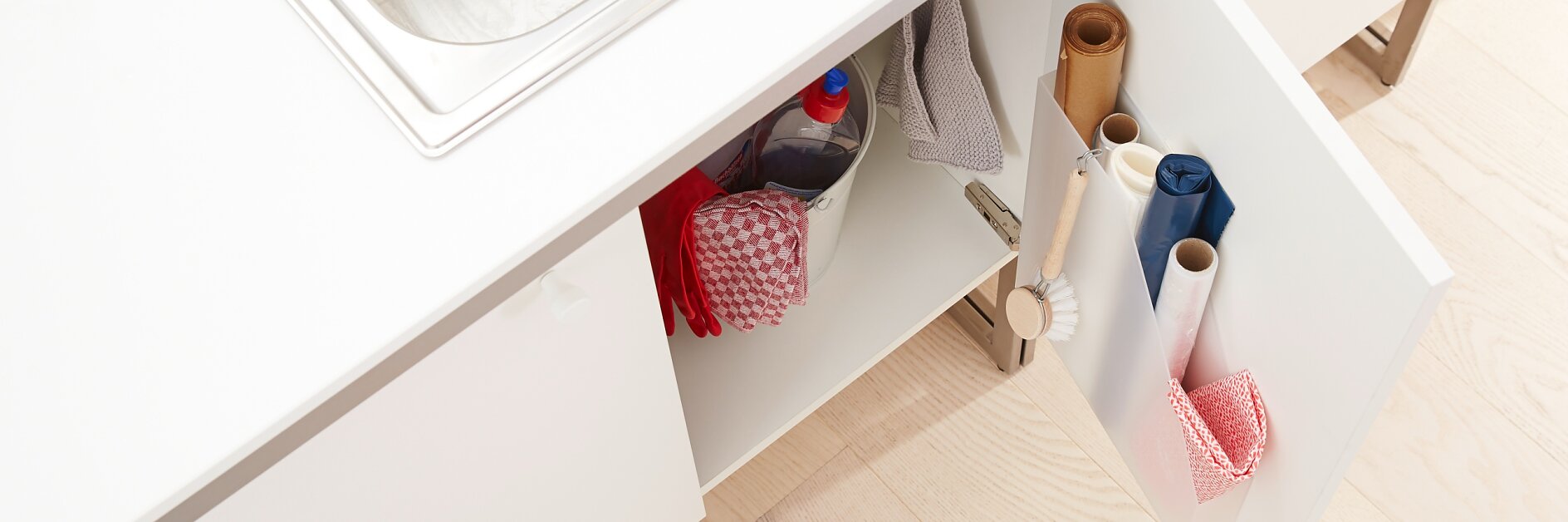 Organization ideas: The magazine rack counts among your most useful kitchen accessories. It is mounted with the removable adhesive strips tesa Powerstrips® LARGE.