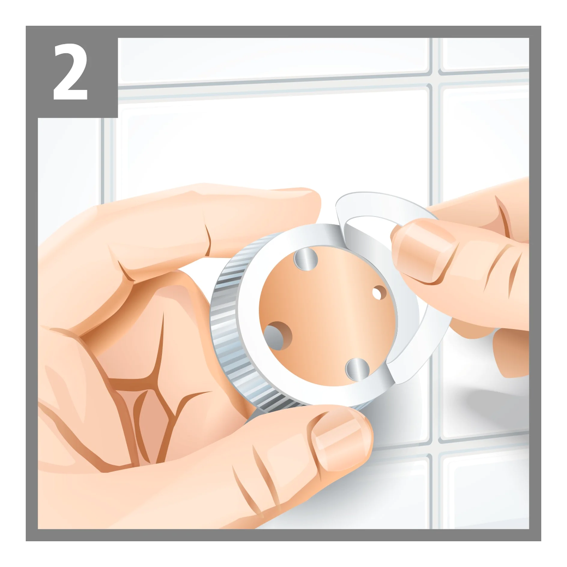 Illustration shows two hands holding a circular, silver object with a beige center and three holes. A small, semicircular tesa tape sticker is being peeled off the objects edge. The background features white, square tiles. A number 2 is in the top left corner. (This text has been generated by AI)