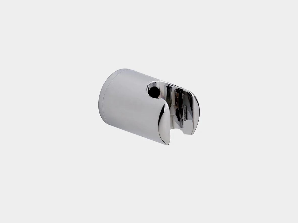 A metal wall mount bracket with a cylindrical shape and a semicircular groove. It has two circular holes on its surface for attachment using tesa tape, and it boasts a shiny chrome finish. (This text has been generated by AI)