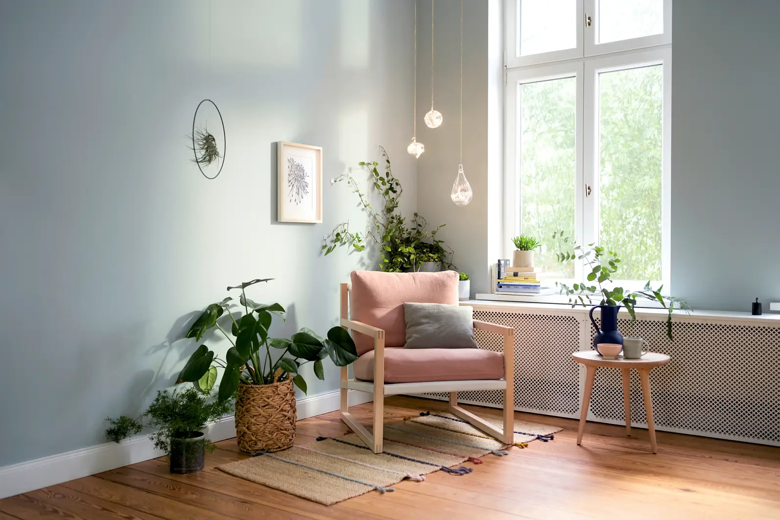 Wohnzimmer-Highlights – Teaser: Wohnzimmerecke mit Sessel, Pflanzen, Licht