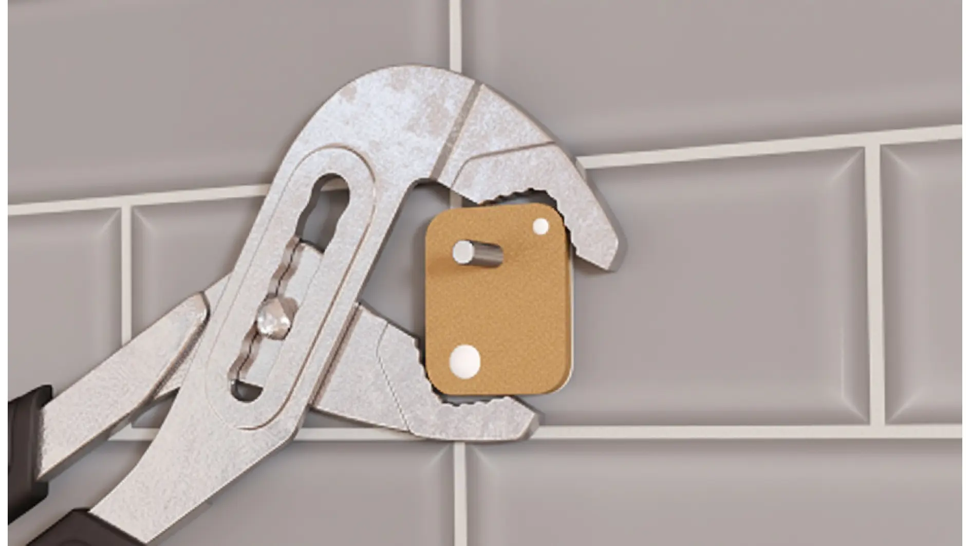 Eine verstellbare Zange hält ein kleines, flaches, rechteckiges Stück mit zwei hervorstehenden Zapfen und Tesaband an eine Kachelwand. (This text has been generated by AI)
