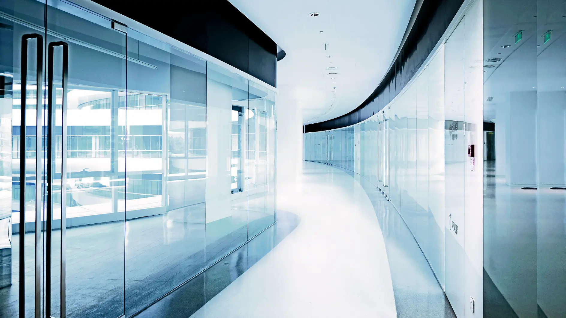 Glass mounting tape could be used in this corridor constructed of windows.