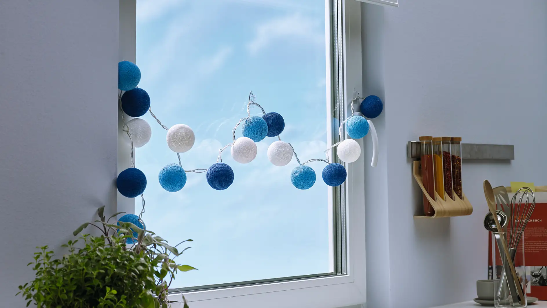 Transparent and almost invisible adhesive hooks for mounting decorative objects on windows or mirrors.