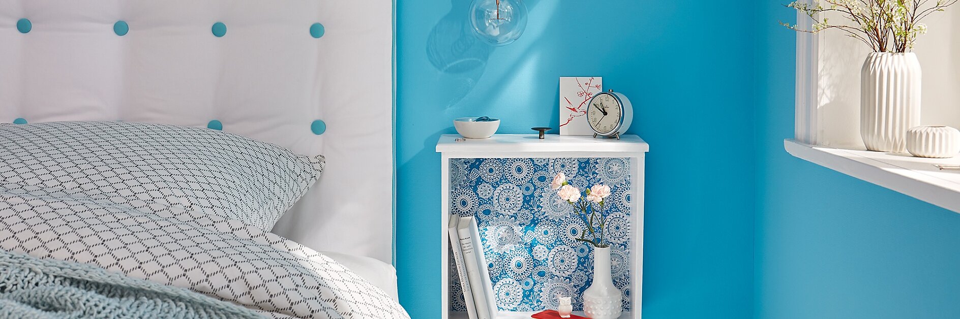 Create a DIY bedside table out of a drawer!