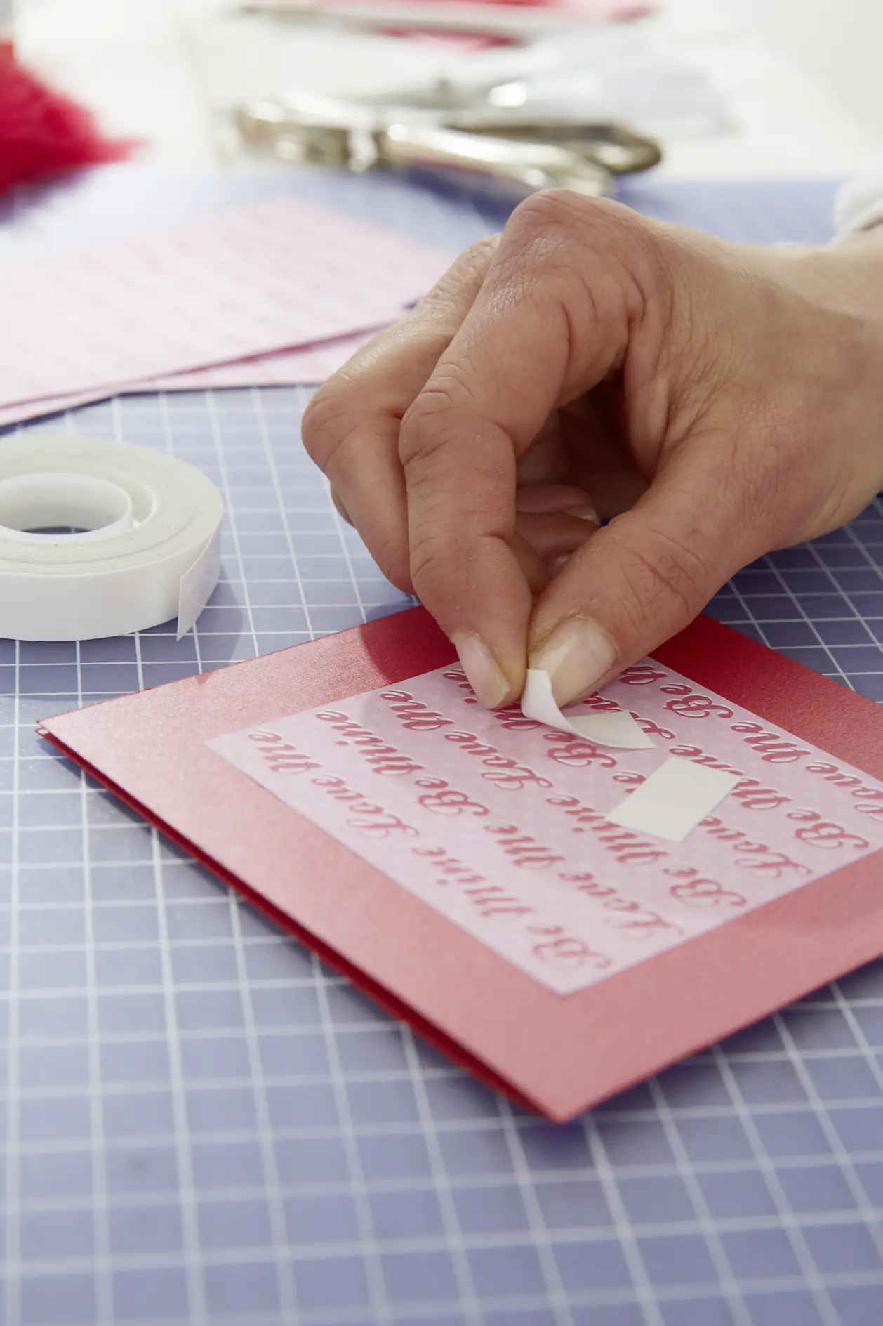 DIY Valentine's Card / Step 3: Stick on tesa® double-sided adhesive tape