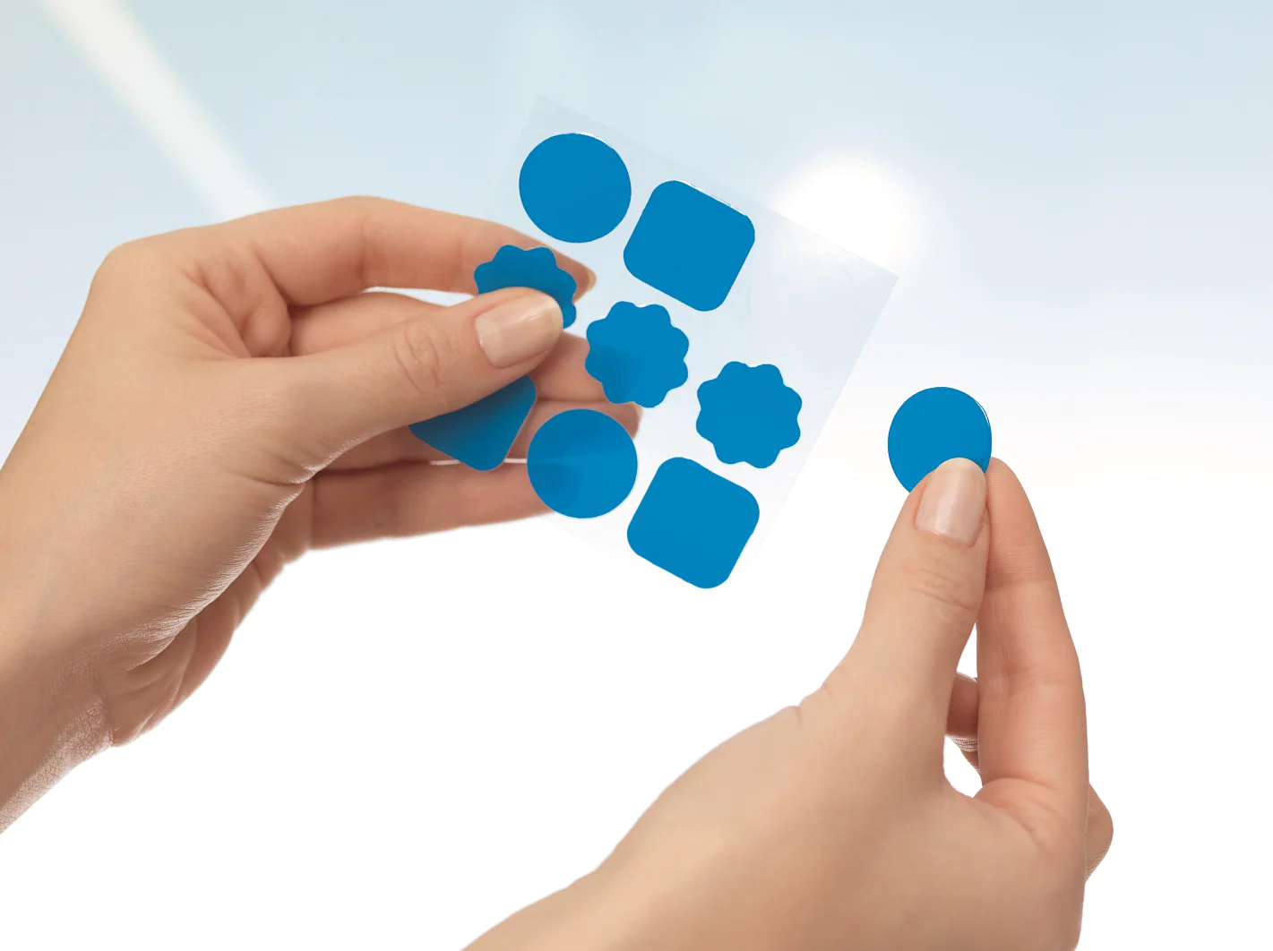 tesa TACK double-sided adhesive pads available in 3 different shapes