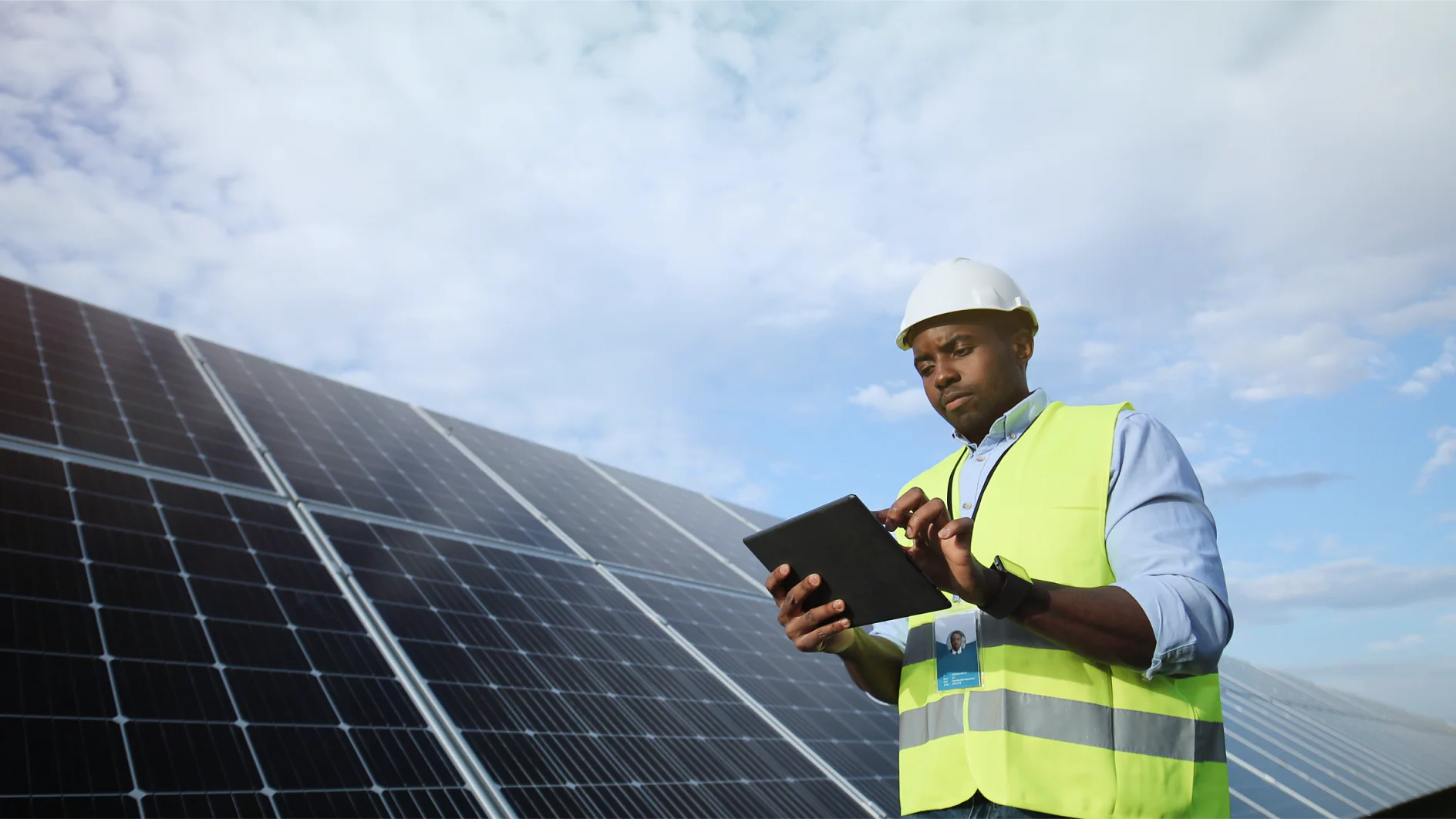 Solar engineer in front of generation 1 panel