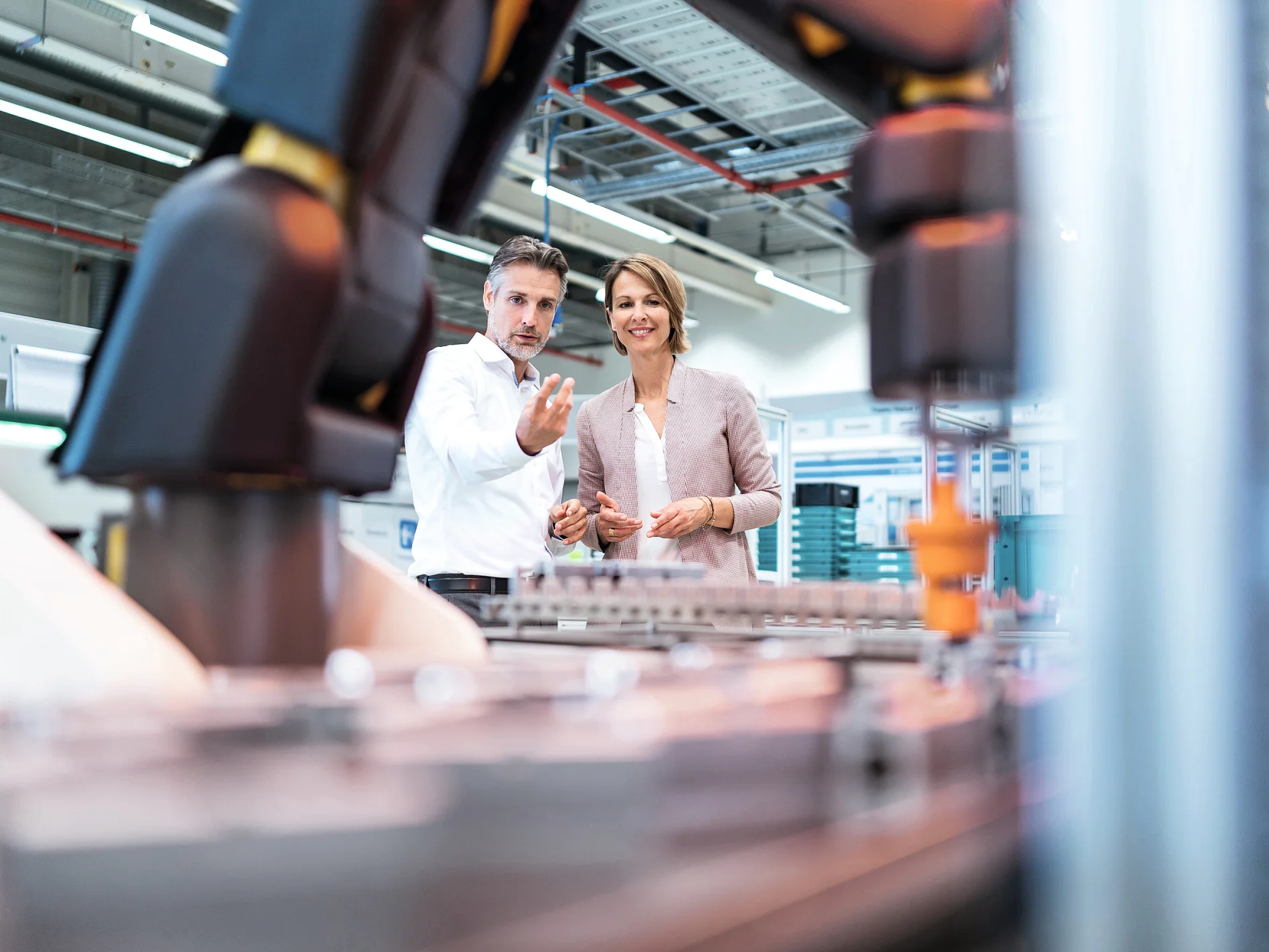 people-engineers-robot-industrial-production