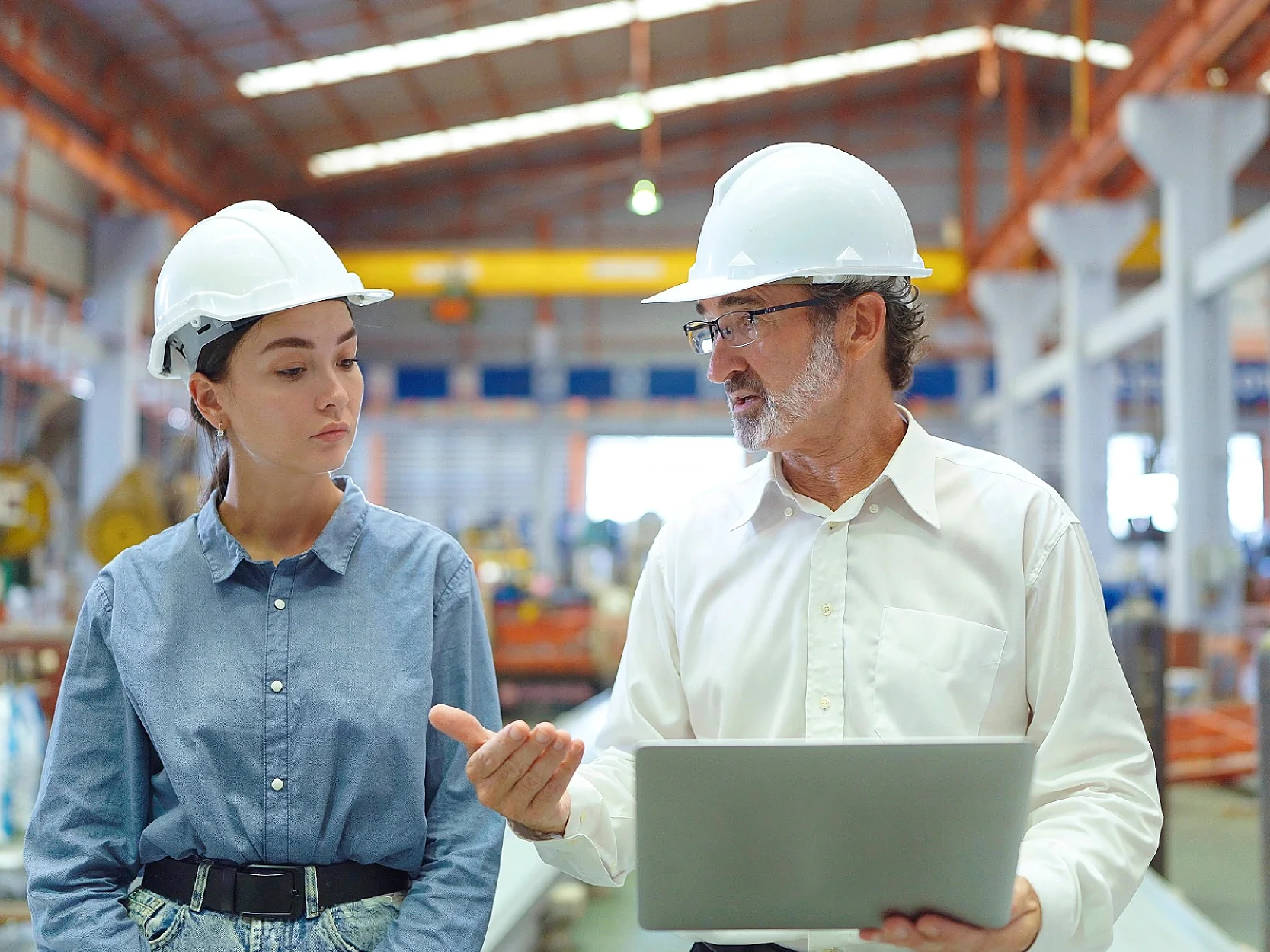 two people in logistic environment talking