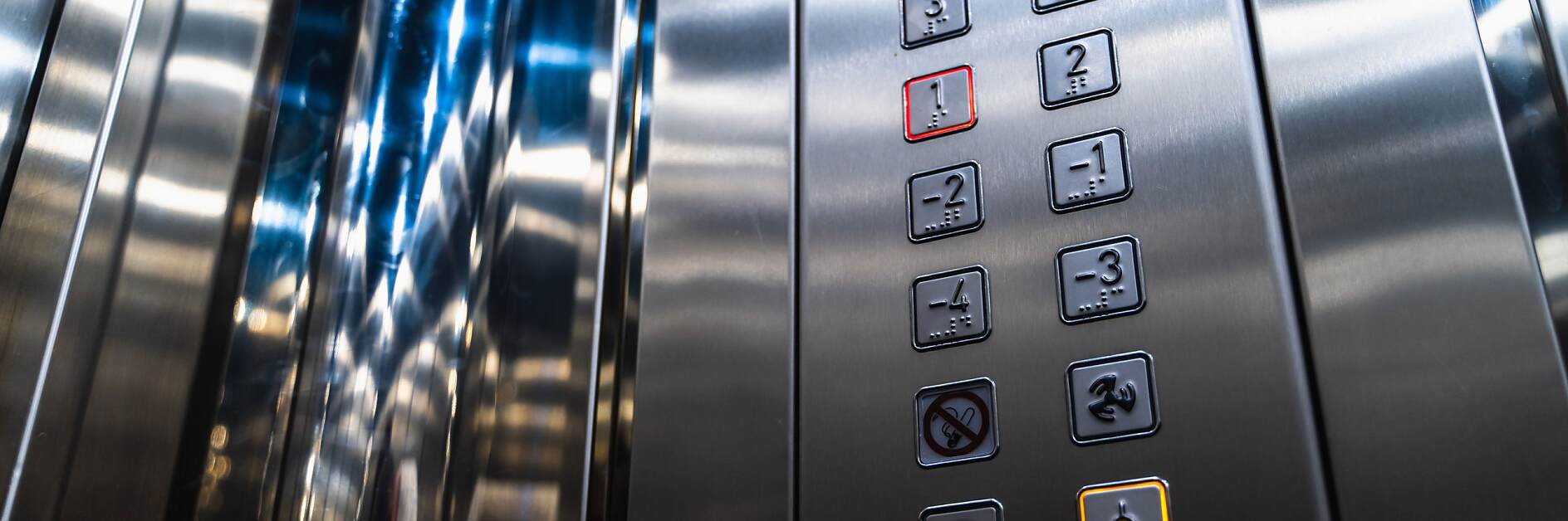 Elevator Buttons for Disabled Blind People with Braille Language Signs on Panel