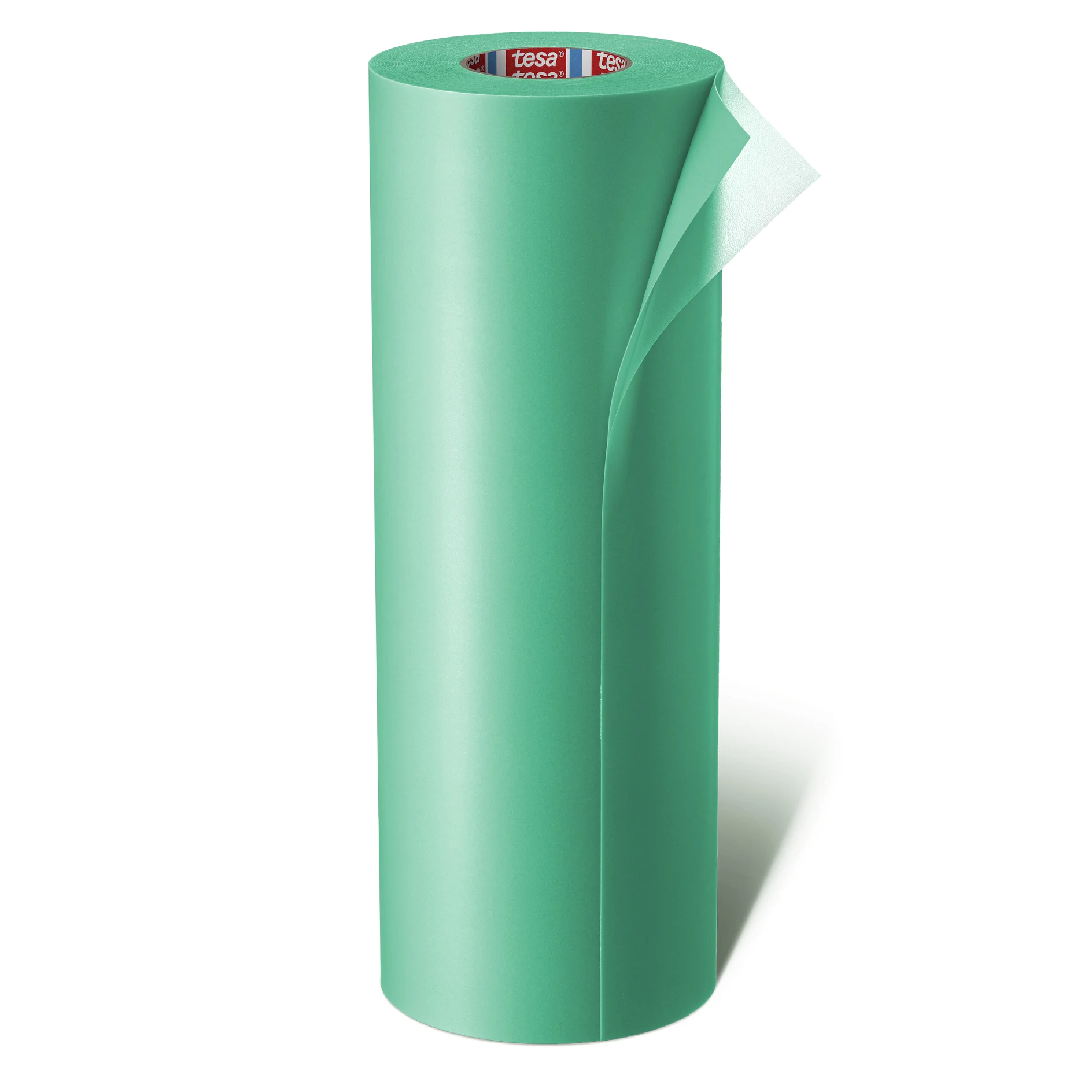Green roll of tesa adhesive tape standing upright with a partially peeled edge on a white background (This text has been generated by AI)