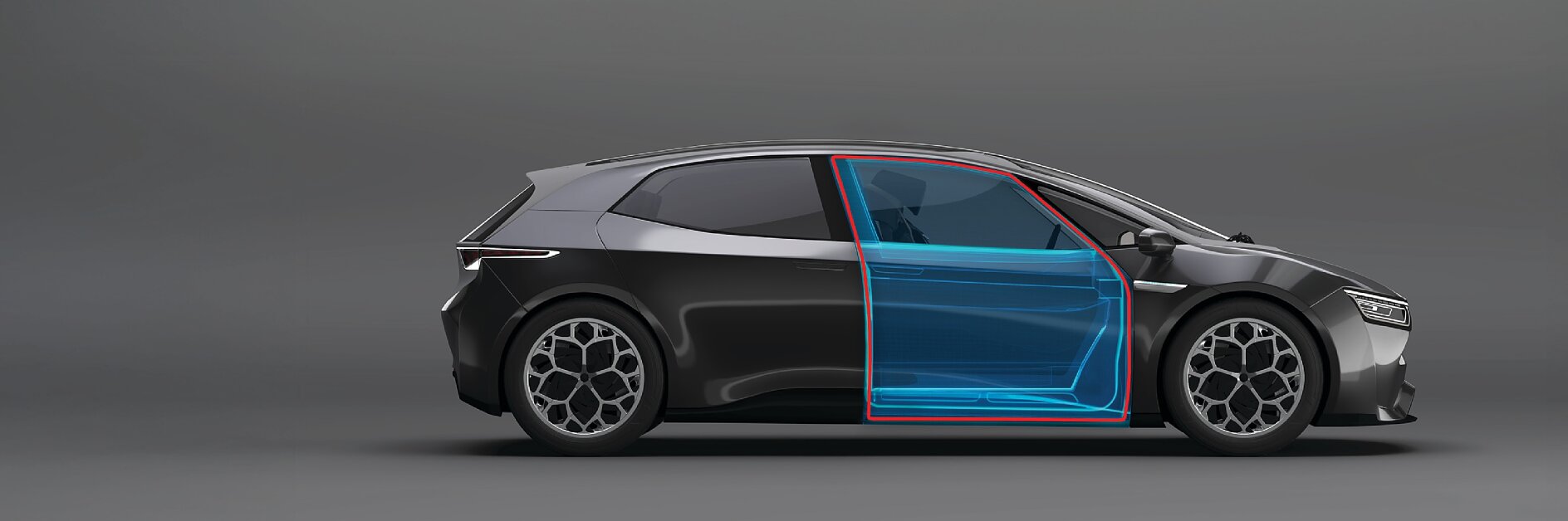 A side view of a modern black hatchback with the front door outline highlighted in blue and red tesa tape on a gray background.