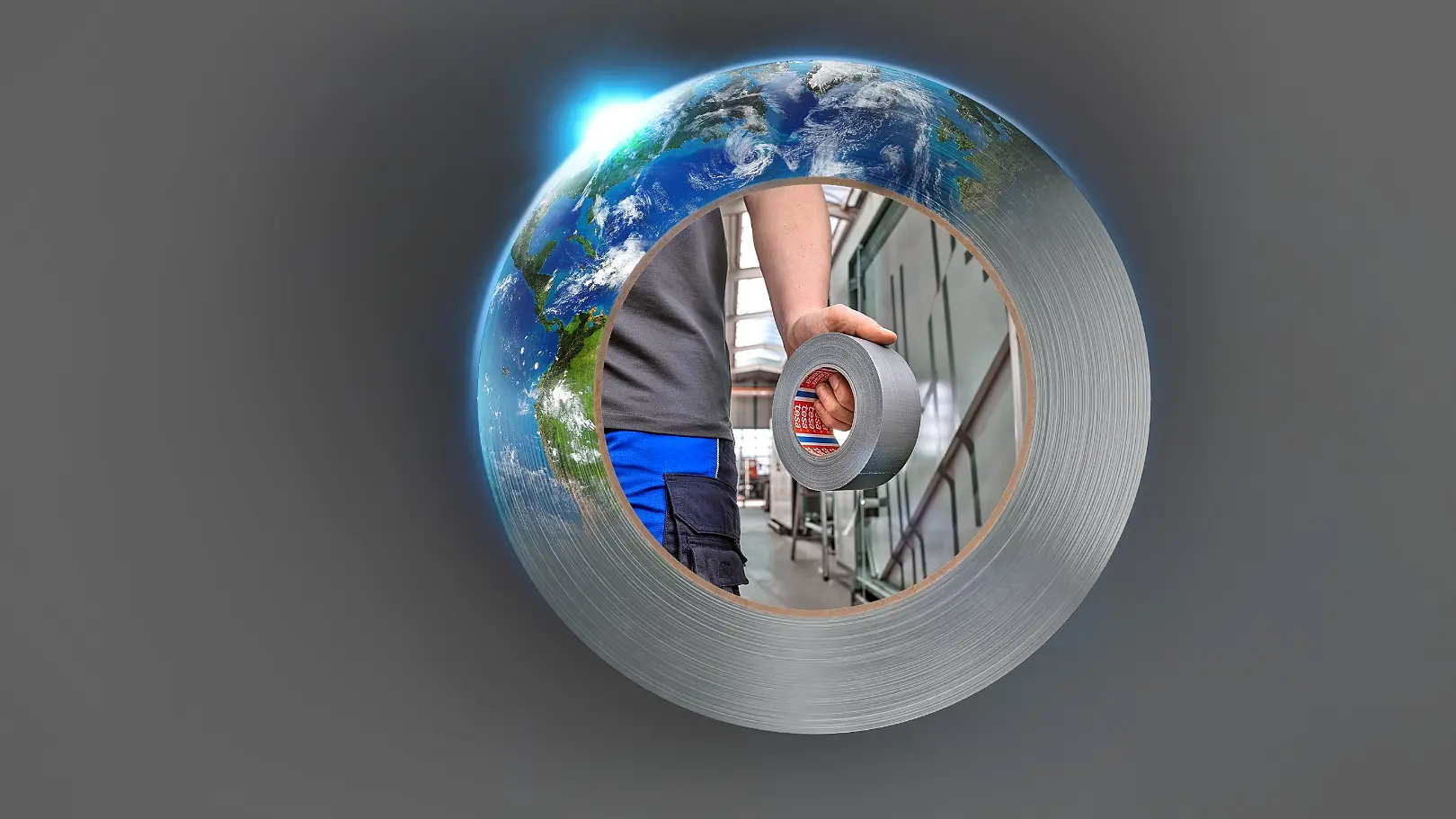 A globe with countries partially visible is encased in a metal washer. Inside the washer, a person in blue works with tools, focusing on a red object secured with tesa tape. The background is gray, and the overall composition combines industrial and global elements. (This text has been generated by AI)