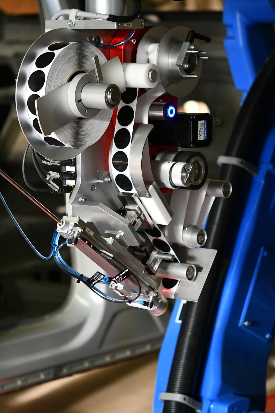 Automated hole covering_tesa tape Automated Hole covering process with robotic equipment