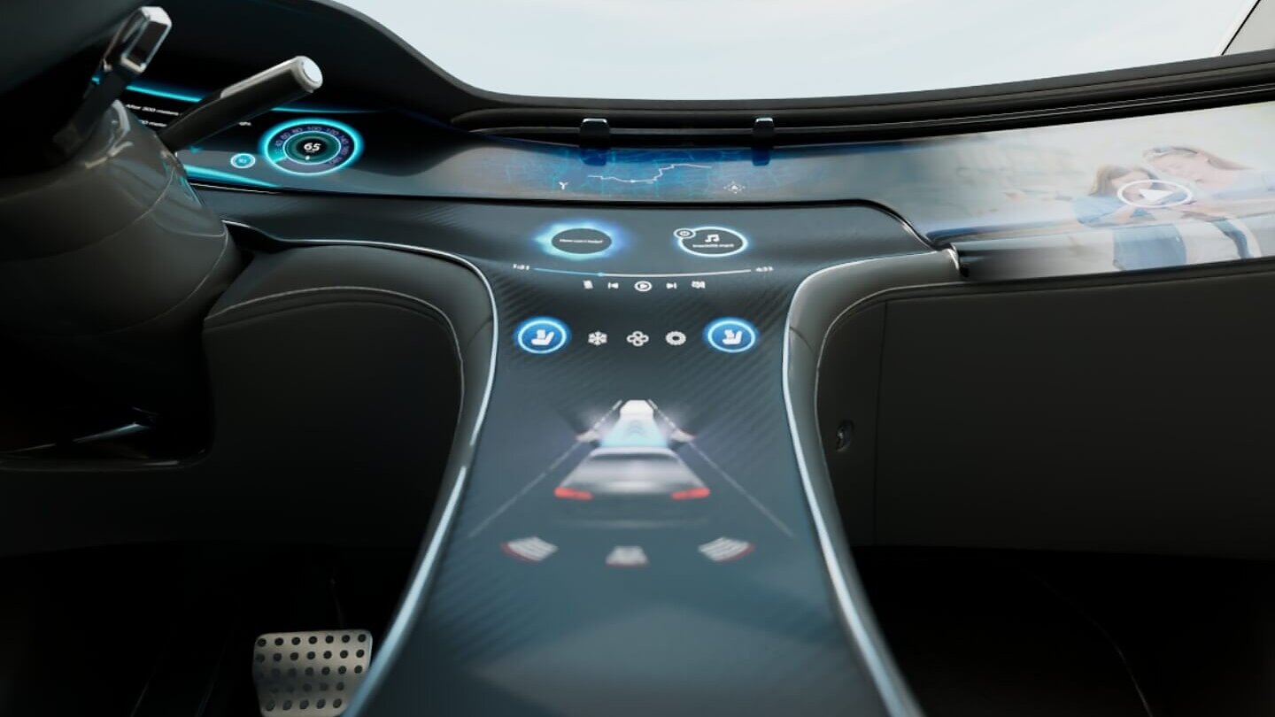 Tesa - OCA yellowing - Why Futuristic car interior featuring a sleek dashboard with embedded digital displays. The center console has touch controls and a digital representation of the car. A steering wheel and foot pedal are visible on the left, secured with tesa tape for added stability. (This text has been generated by AI)