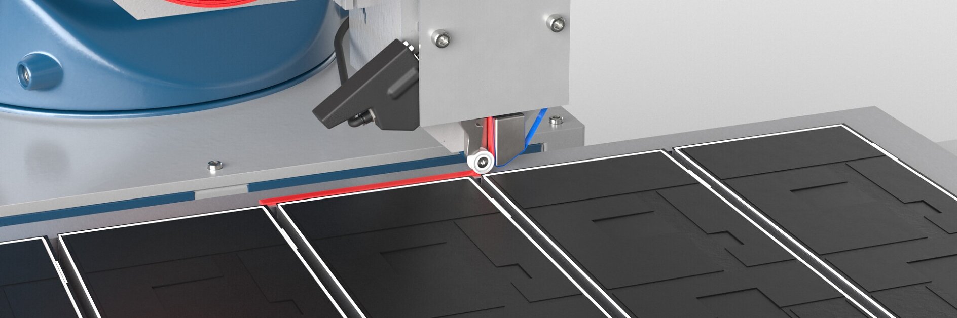 tesa branded industrial machine applying adhesive strips on black sheets in a clean indoor manufacturing setting
