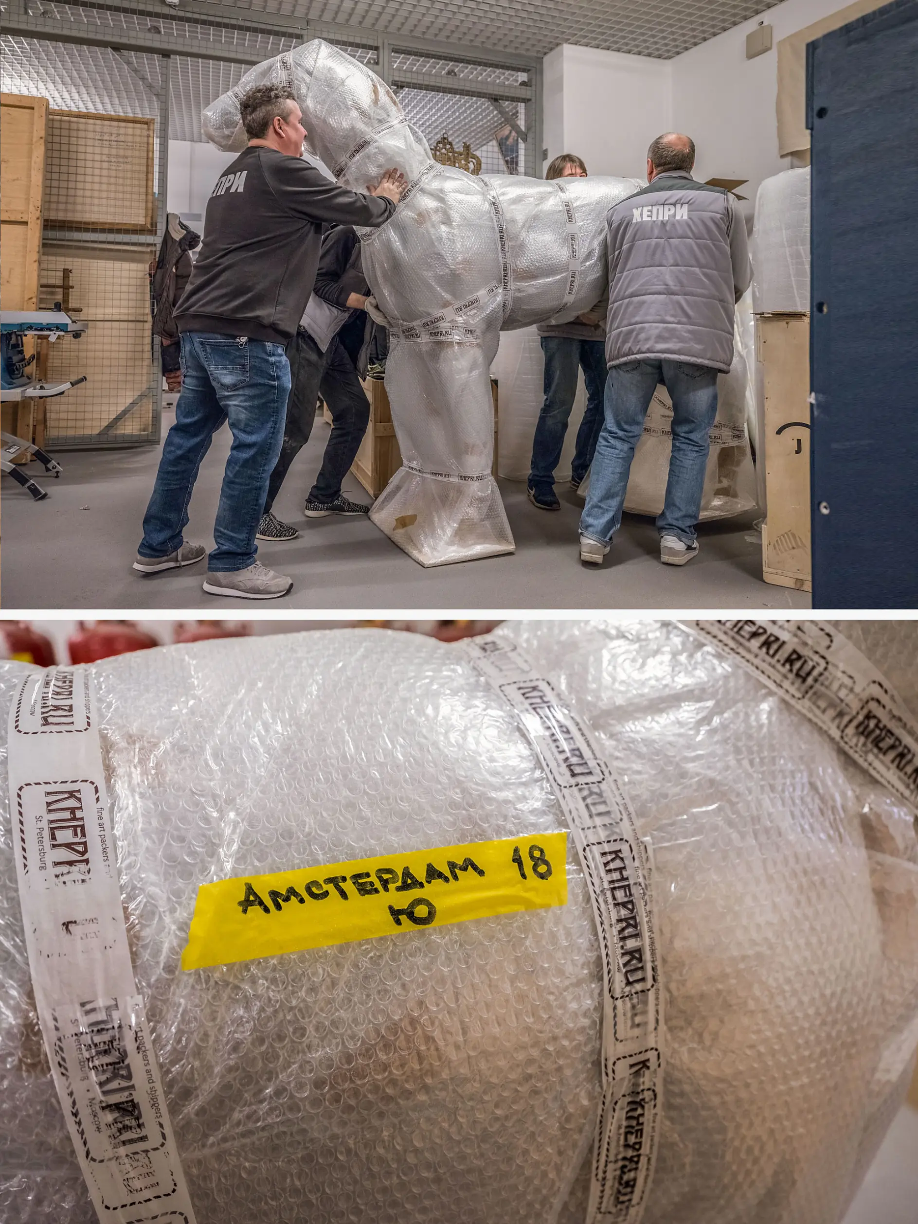 Four people in matching jackets are moving a large statue covered in protective wrapping. The statue appears to be a horse. A close-up shows bubble wrap with a yellow label marked AMSTERDAM and a KEFER band secured with tesa tape.