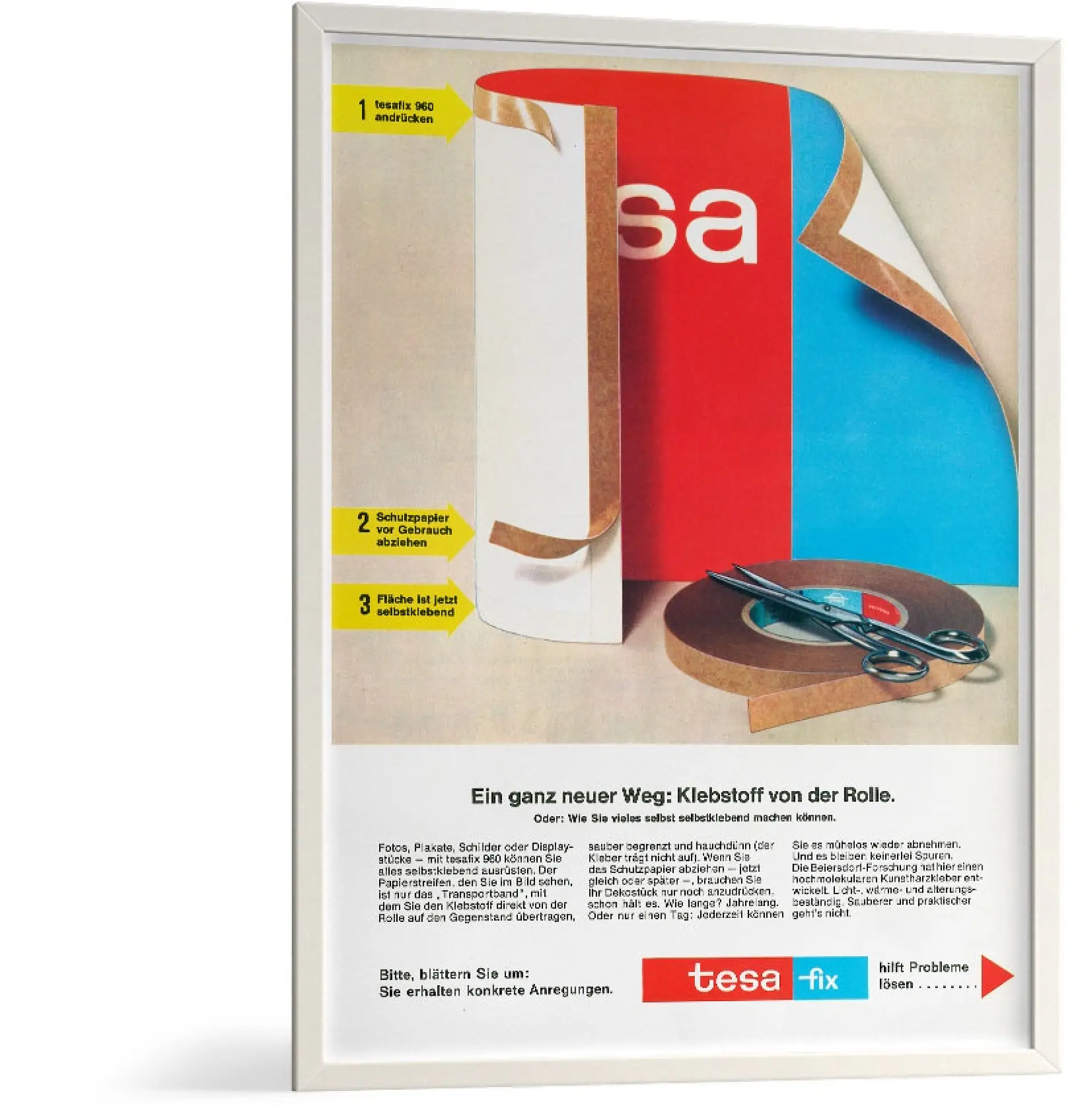 A framed poster advertising a roll of tesa adhesive tape. The poster shows the tesa tape peeling back at the edges from a surface, with a pair of scissors nearby. Text is in German, with branding and product details at the bottom.