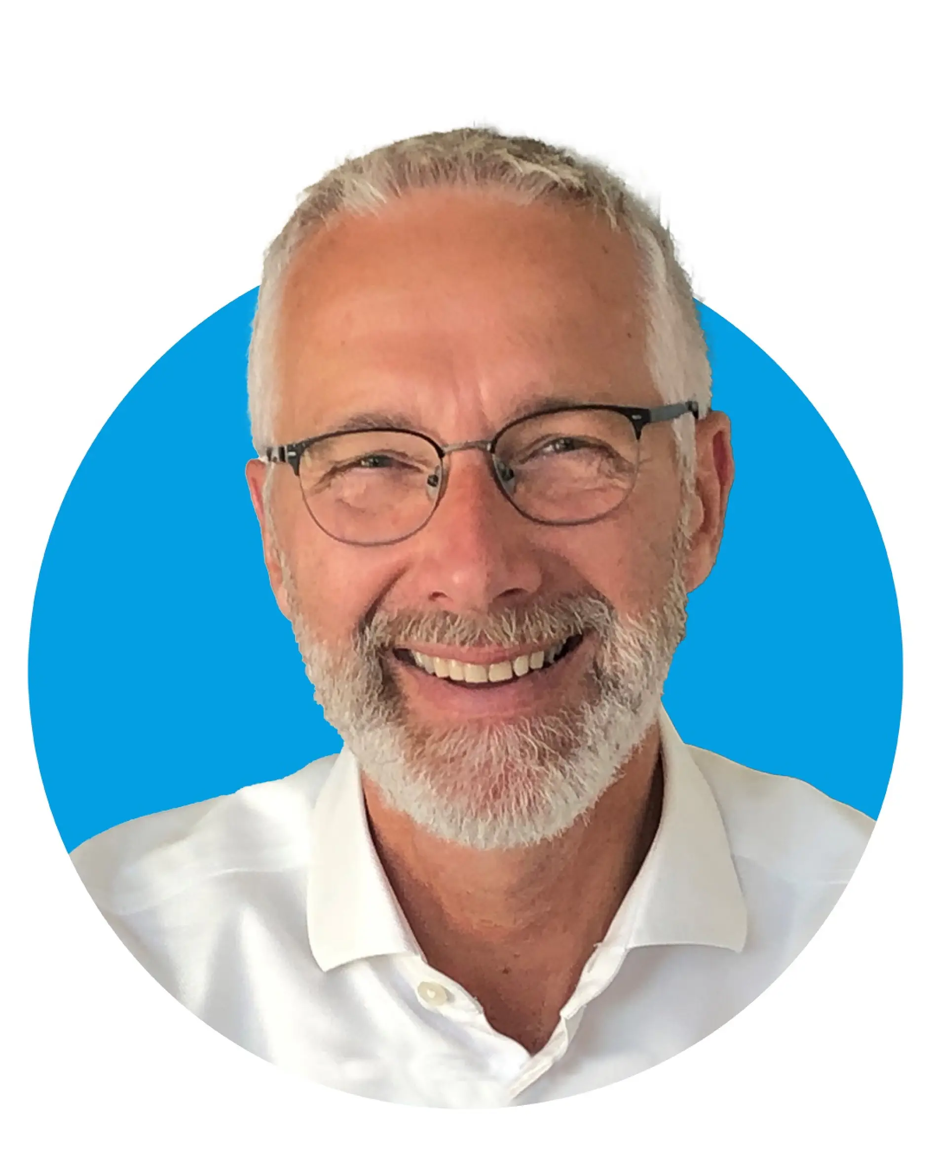 A man with short gray hair and a beard is smiling. He is wearing glasses and a white shirt. The background is a solid blue circle.