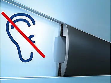 Illustration of a hearing icon crossed out with a red line next to a cylindrical device mounted on a wall using tesa tape. The background is blue and white. (This text has been generated by AI)