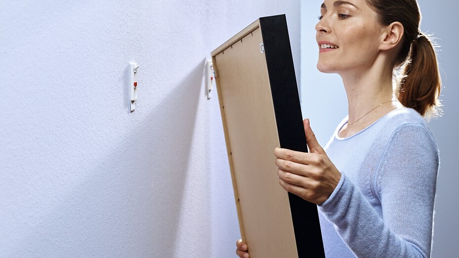 Easily Hang Pictures with Our Adhesive Nails Powerful adhesive nails as an alternative to iron nails. Leave the hammer on the rack!