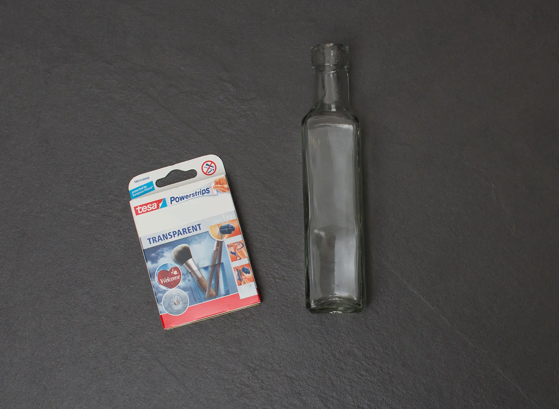tesa Powerstrips® Strips Transparent Large can be used to make wall vases from glass bottles.