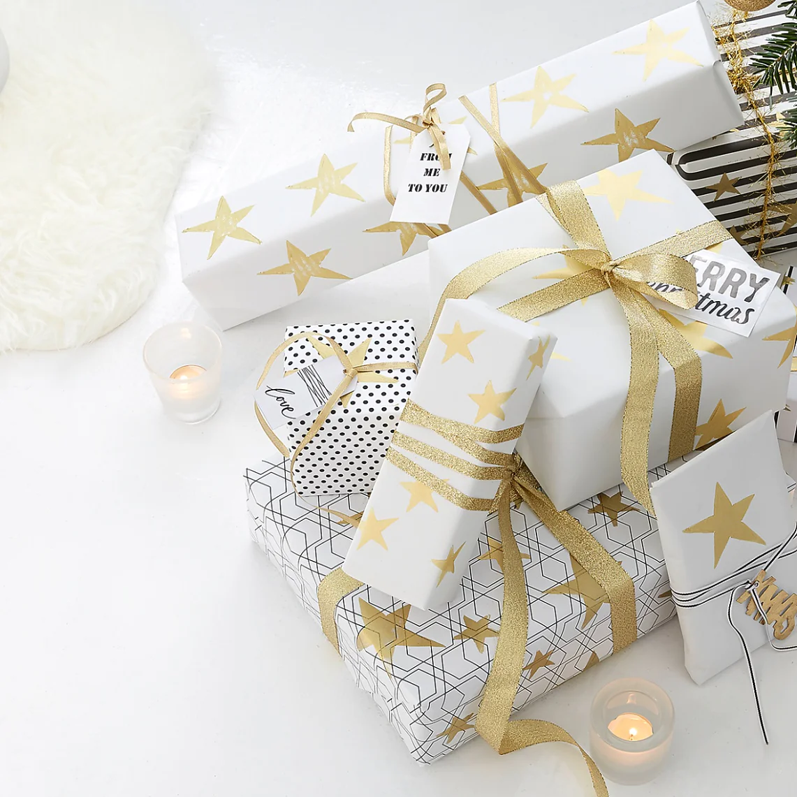 Striking gold prints with star stamps turn simple wrapping paper into something special. The stamps are easy to make and can be used for various purposes.