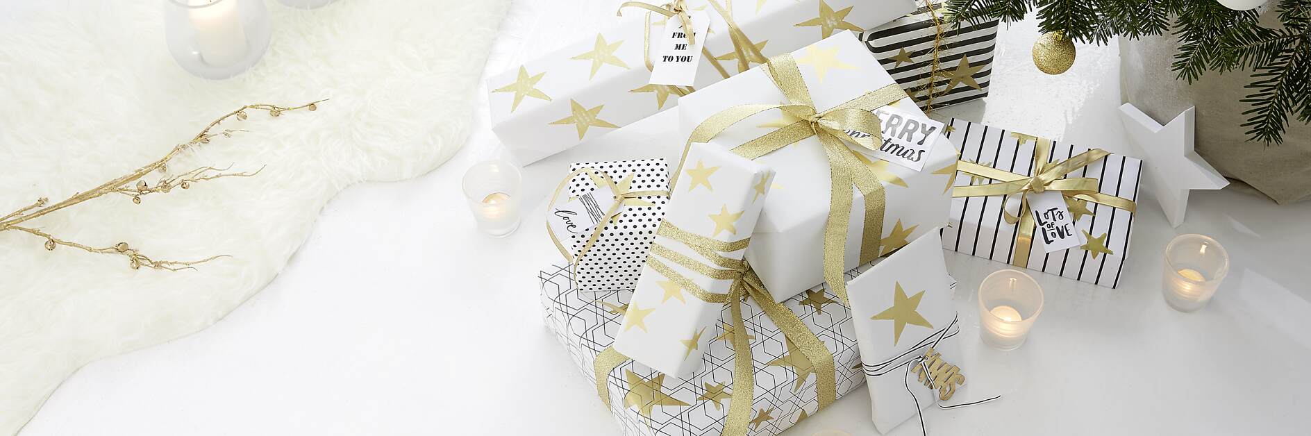 Gift wrapping with golden stamps