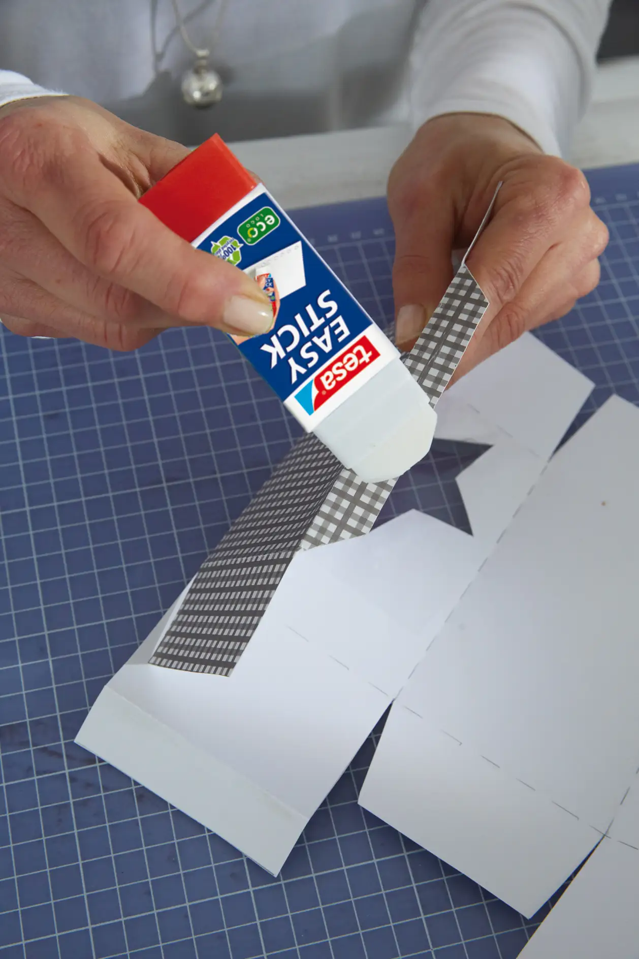 DIY Elegant Folded Cartons / Step 11: Apply tesa Easy Stick®ecoLogo