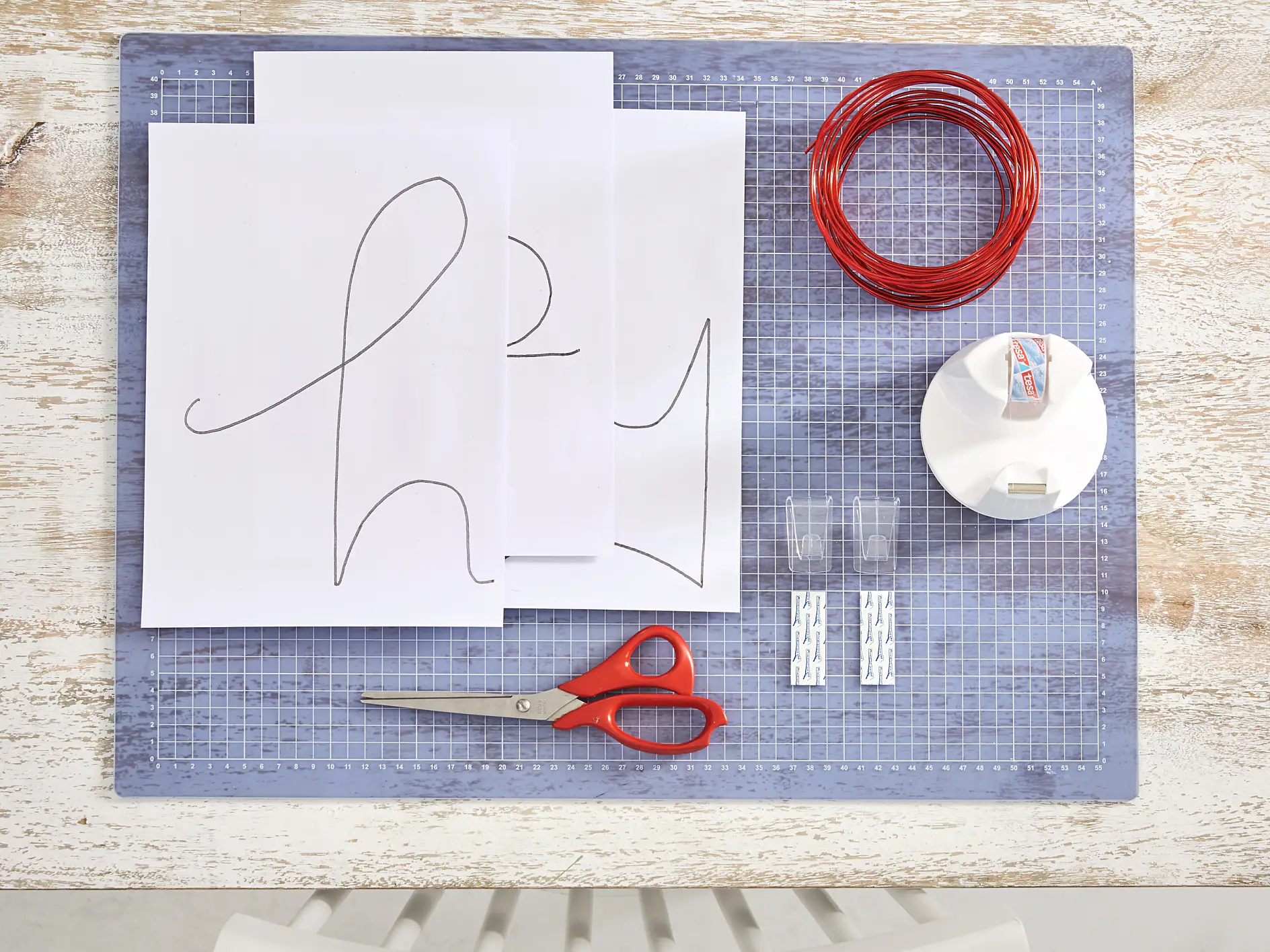 Overview of materials needed for a wire writing wall decoration