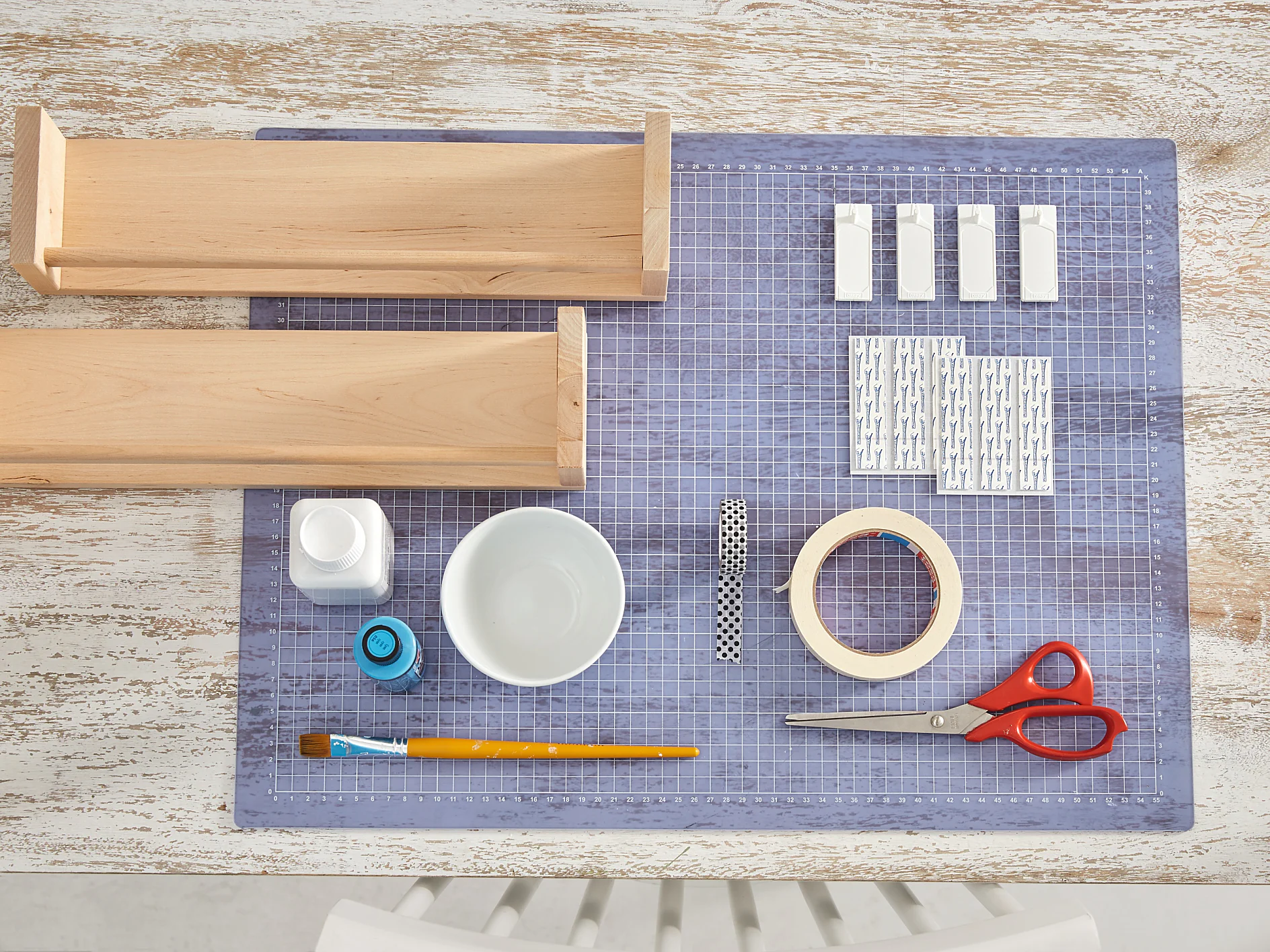 Overview of materials needed for bathroom storage shelves