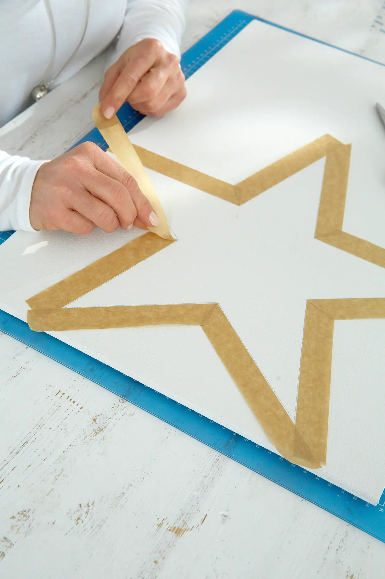 Cover the star with masking tape