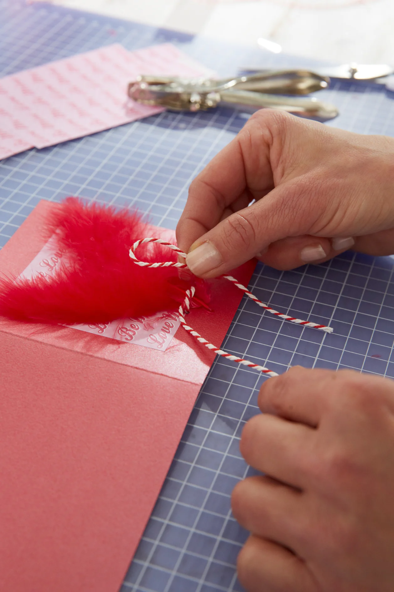 DIY Valentine's Card / Step 6: Pull ribbons through