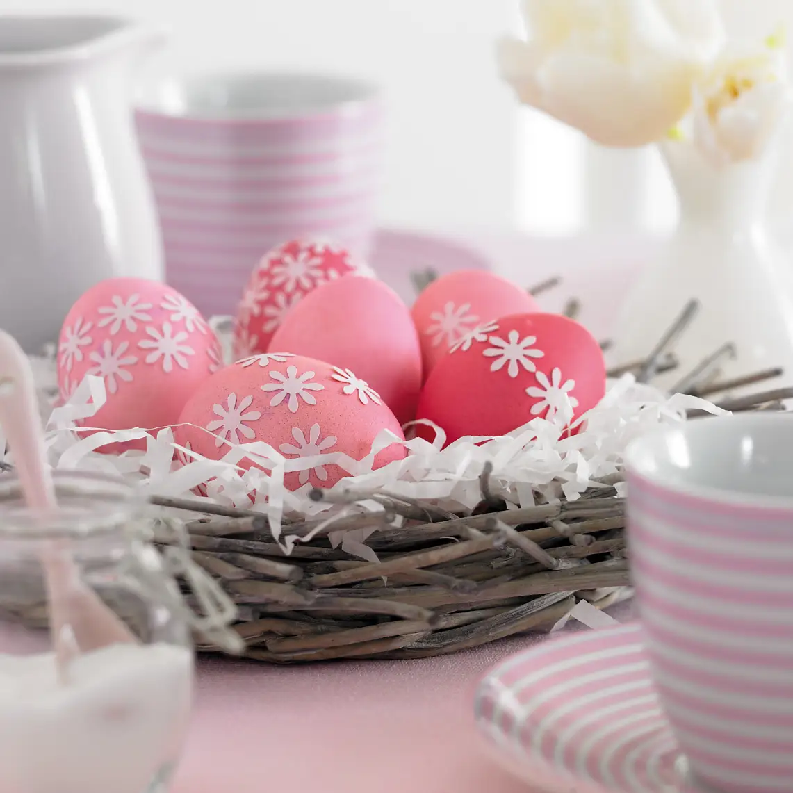 Isn't that lovely: Decorate your Easter eggs with punch-out paper flowers - they're easy to attach.