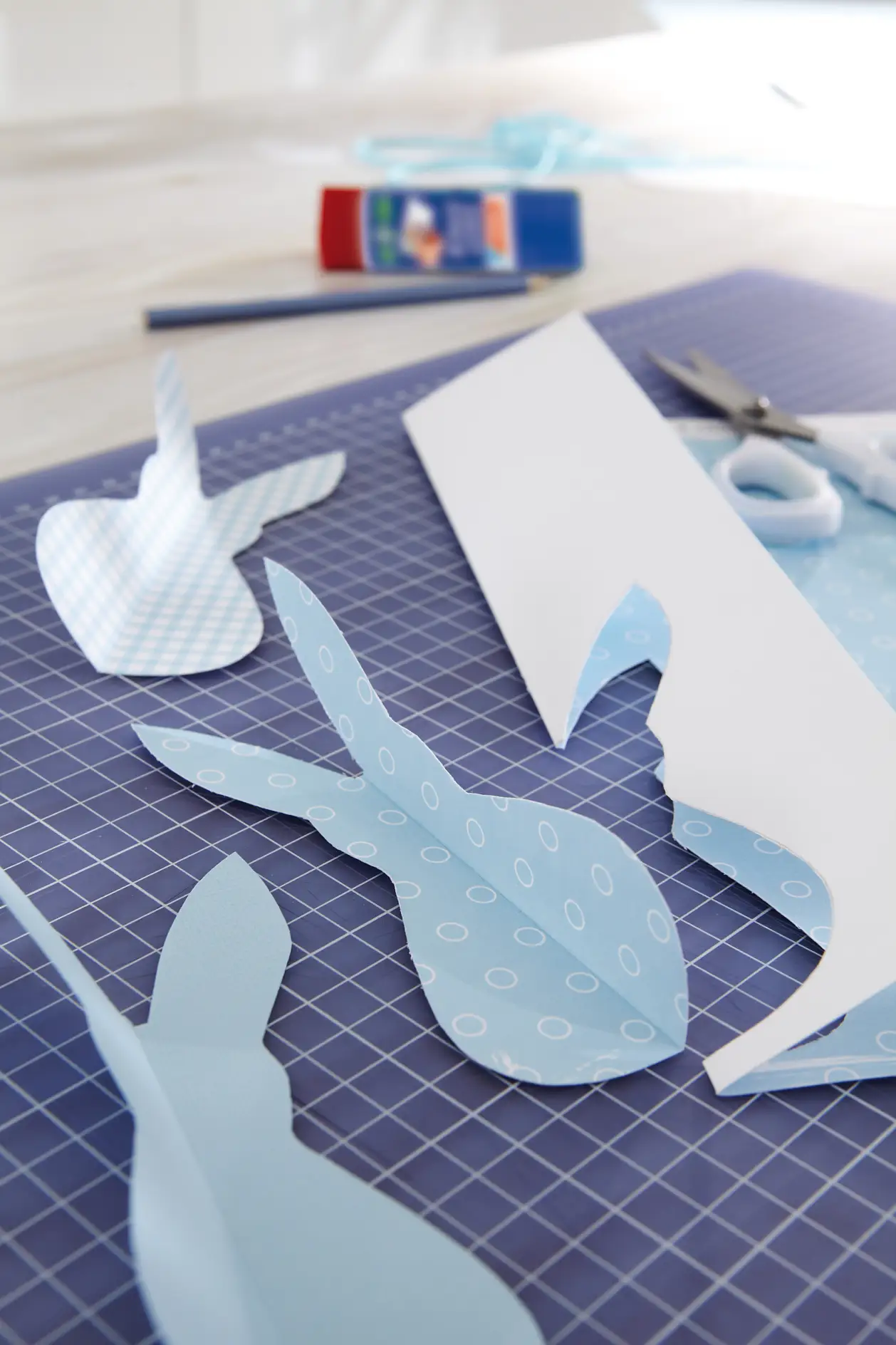 Draw and cut out rabbits.