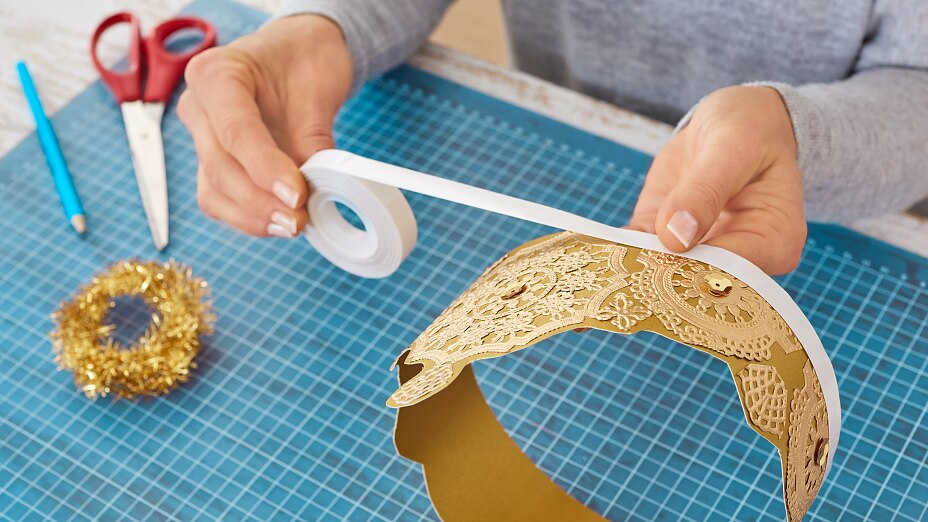 Attach double sided tape to crown Attach double sided tape to crown