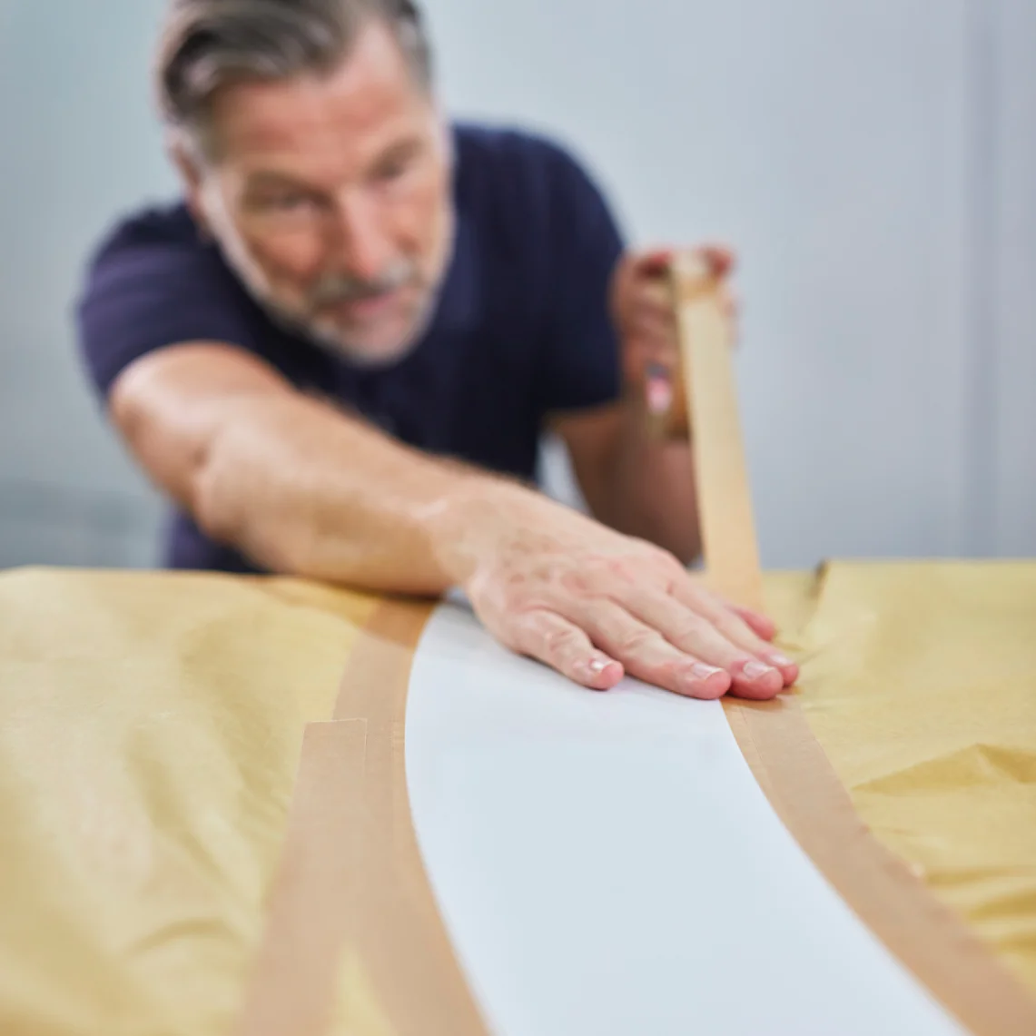 Adding paper masks and fixing them with tesa® 4304 to avoid overspray
