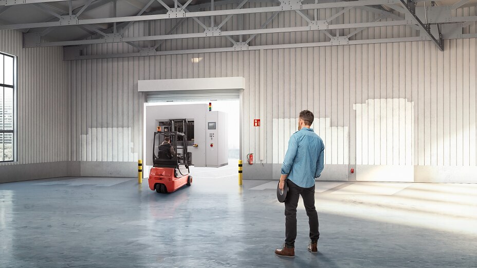 A small stack of products in boxes sitting on a manual pallet jack in a loading dock door at a distribution warehouse. A small stack of products in boxes sitting on a manual pallet jack in a loading dock door at a distribution warehouse.