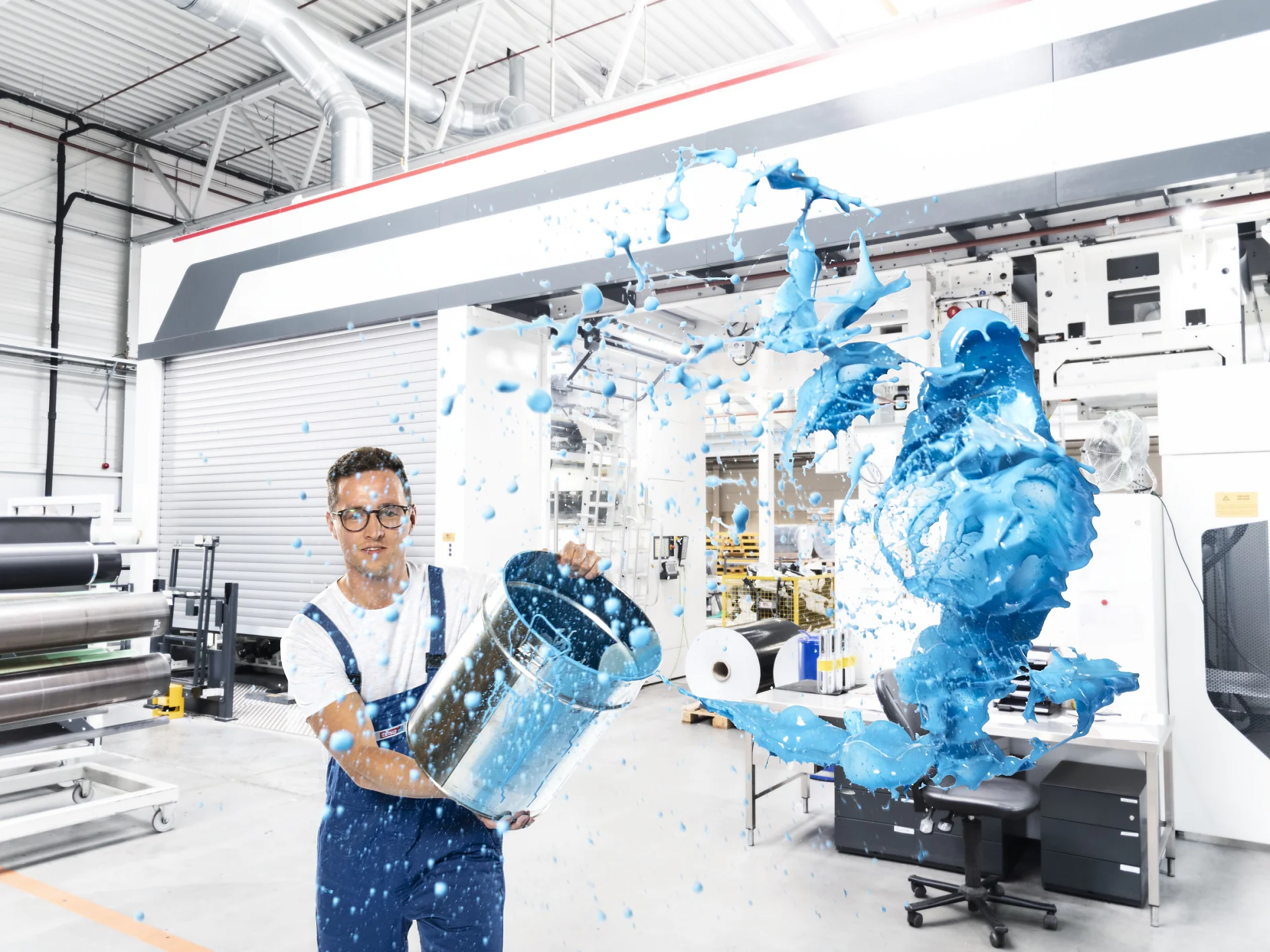 Machine operator spilling ink