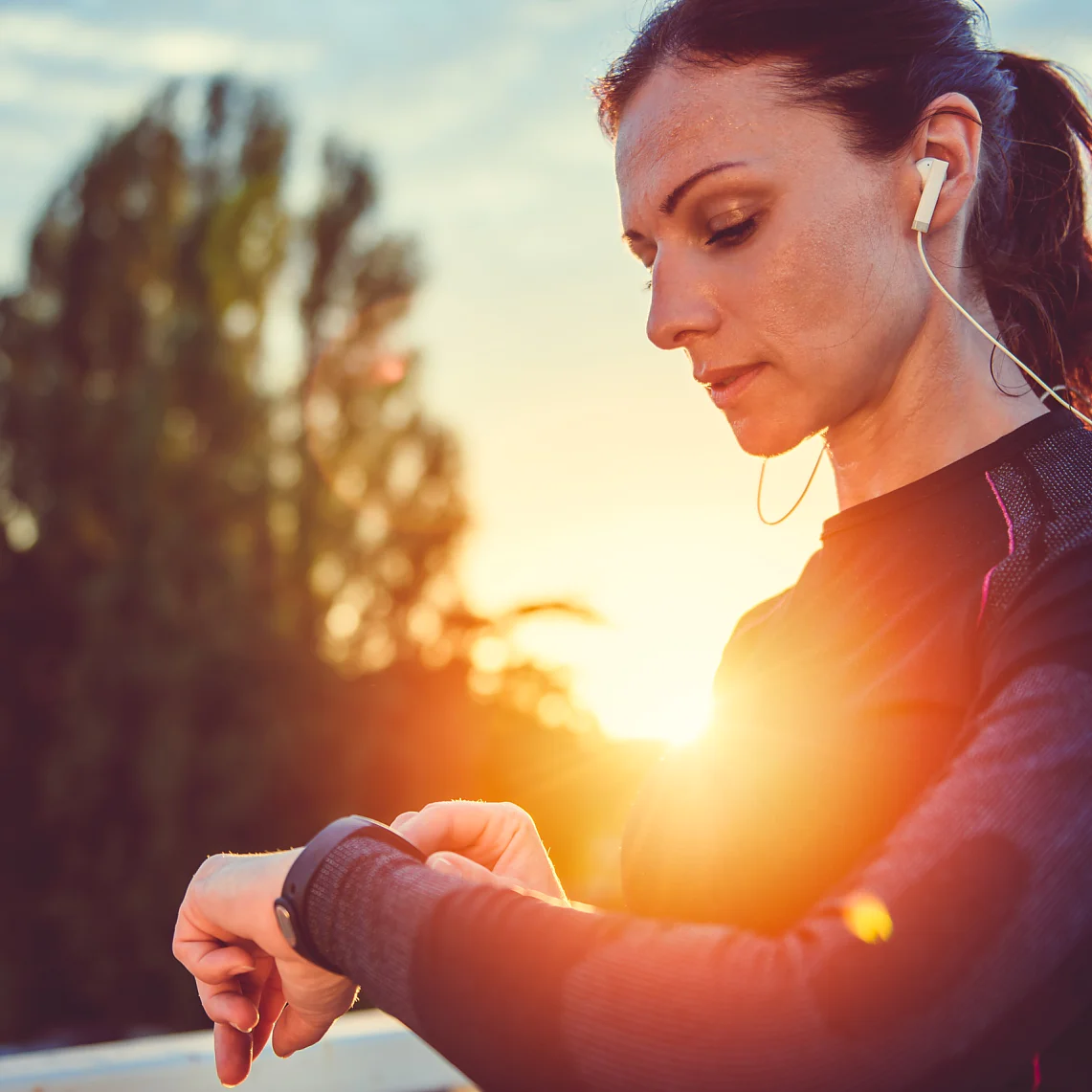 Woman monitoring her progress on smart watch