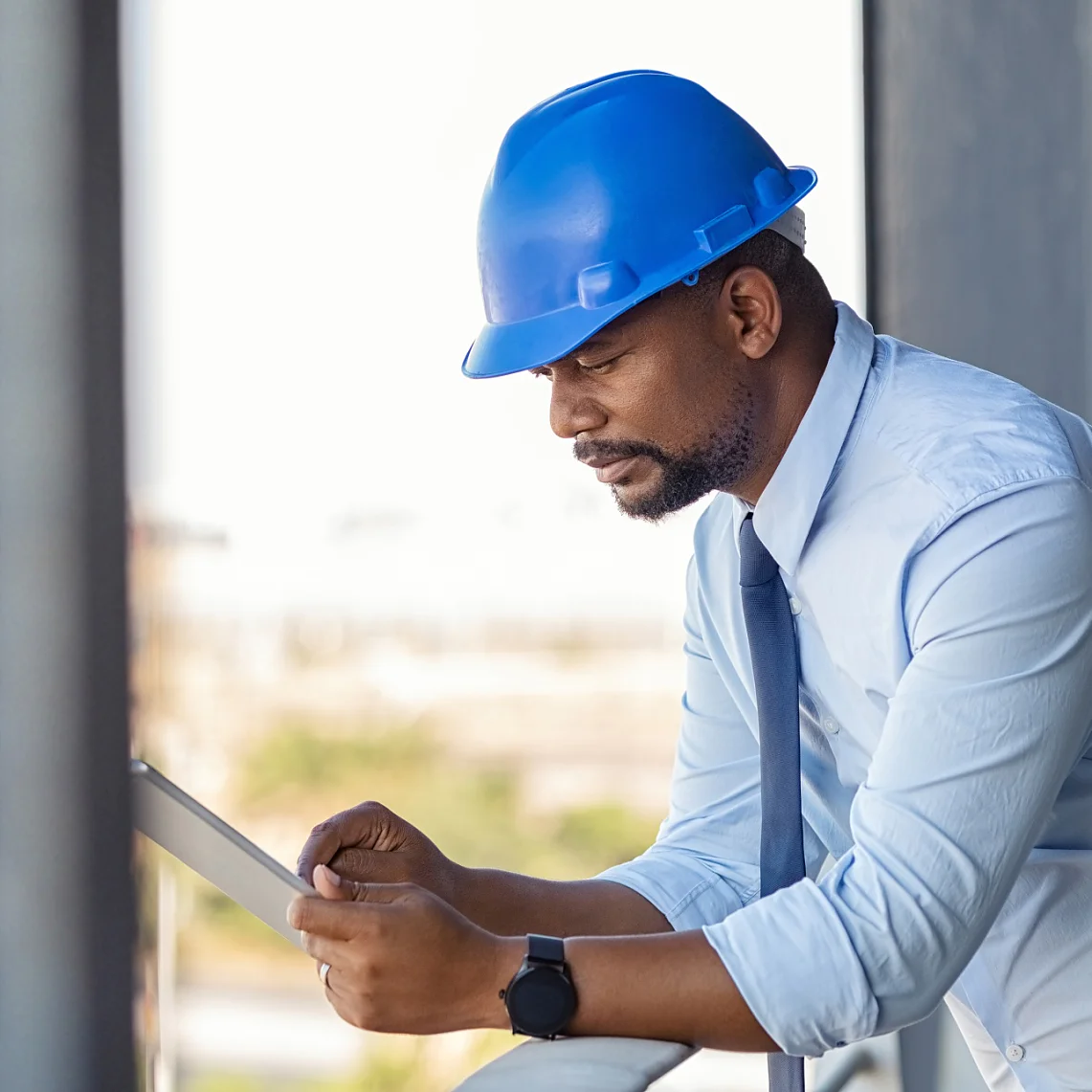 Smart and safe buildings, construction manager with tablet