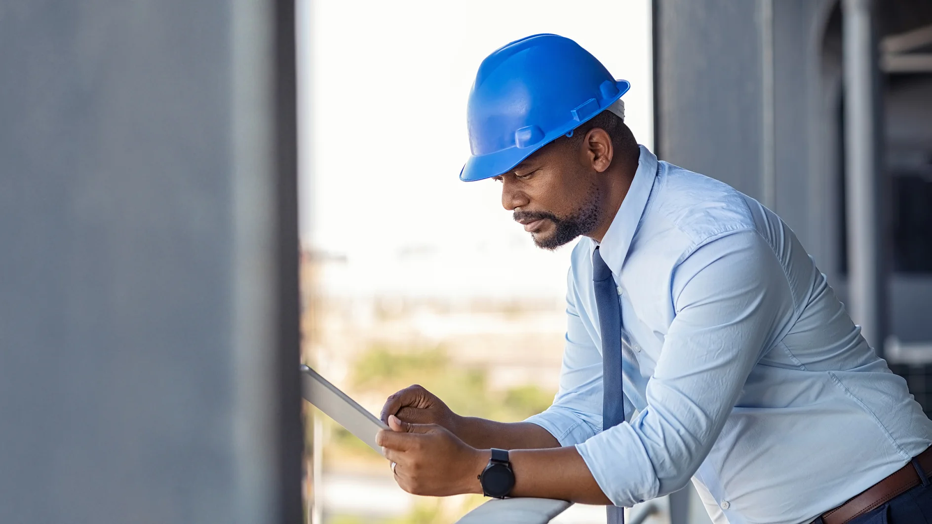 Smart and safe buildings, construction manager with tablet