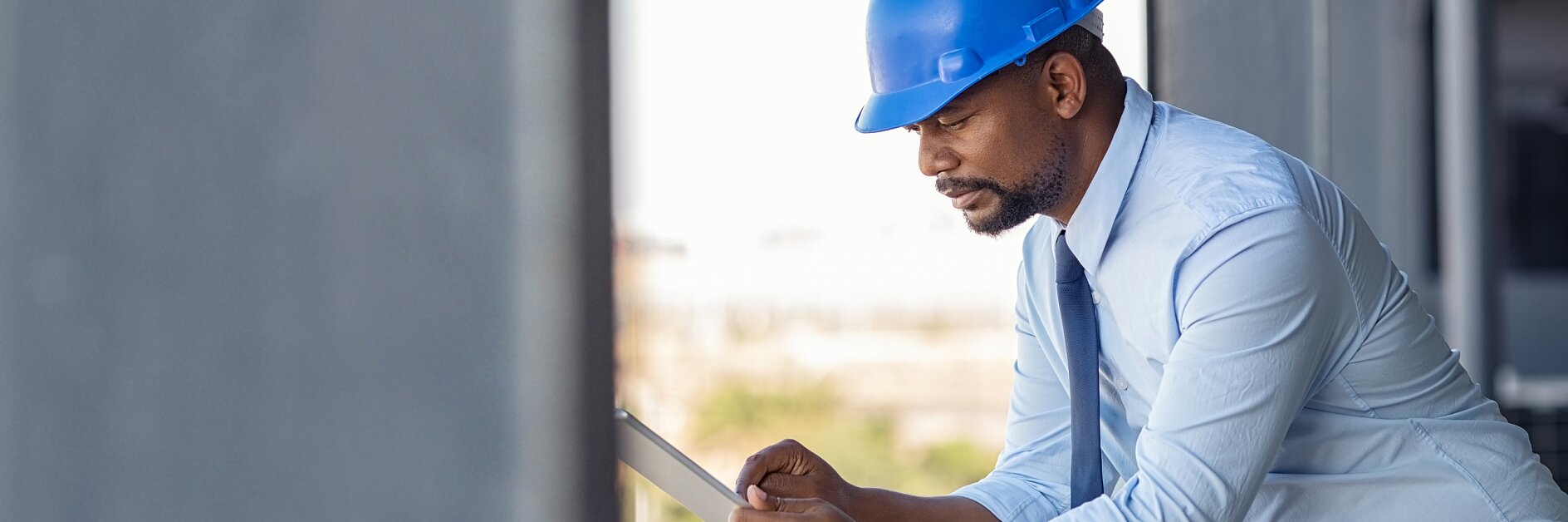 Smart and safe buildings, construction manager with tablet