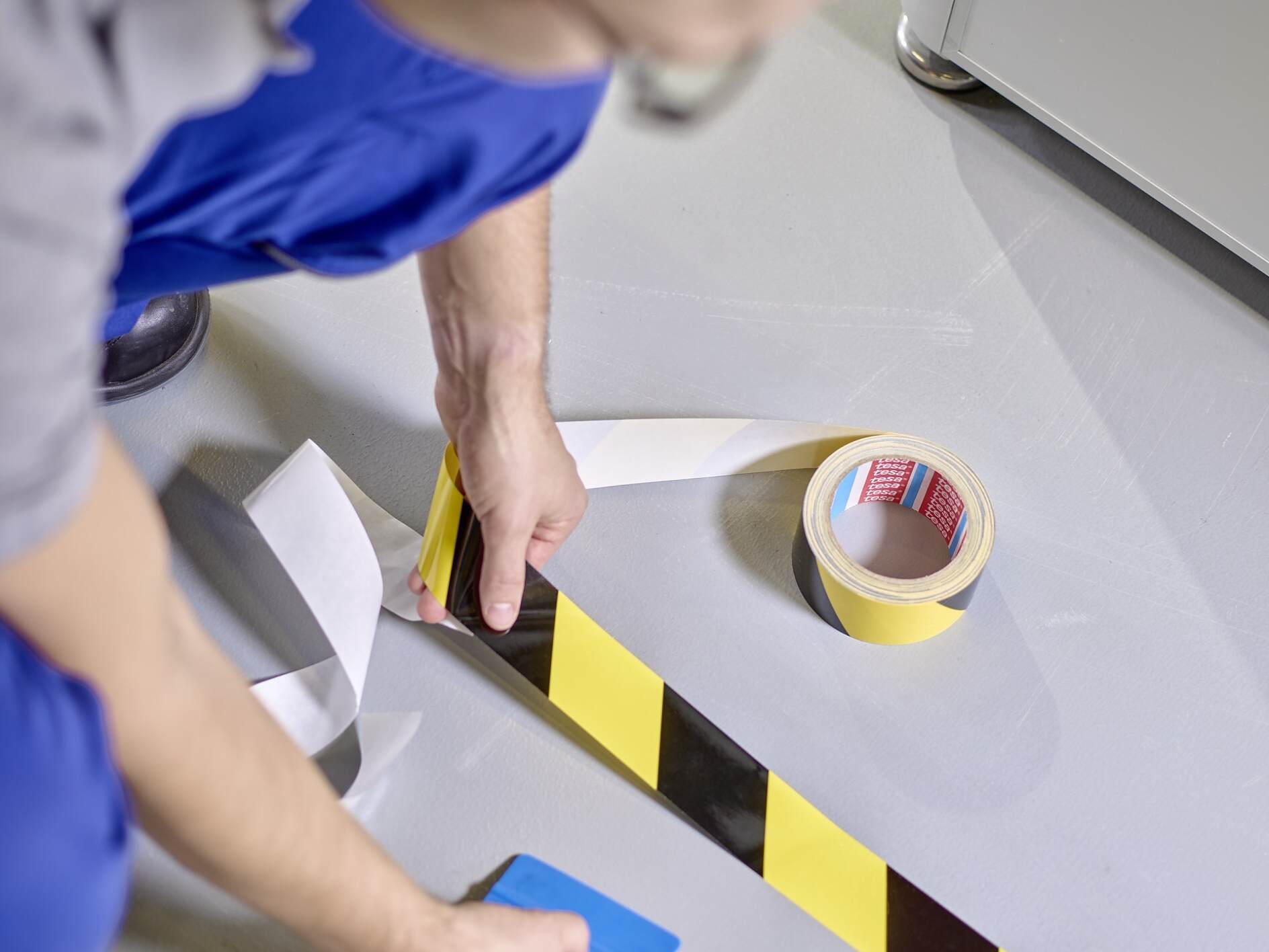 Removable floor marking tape