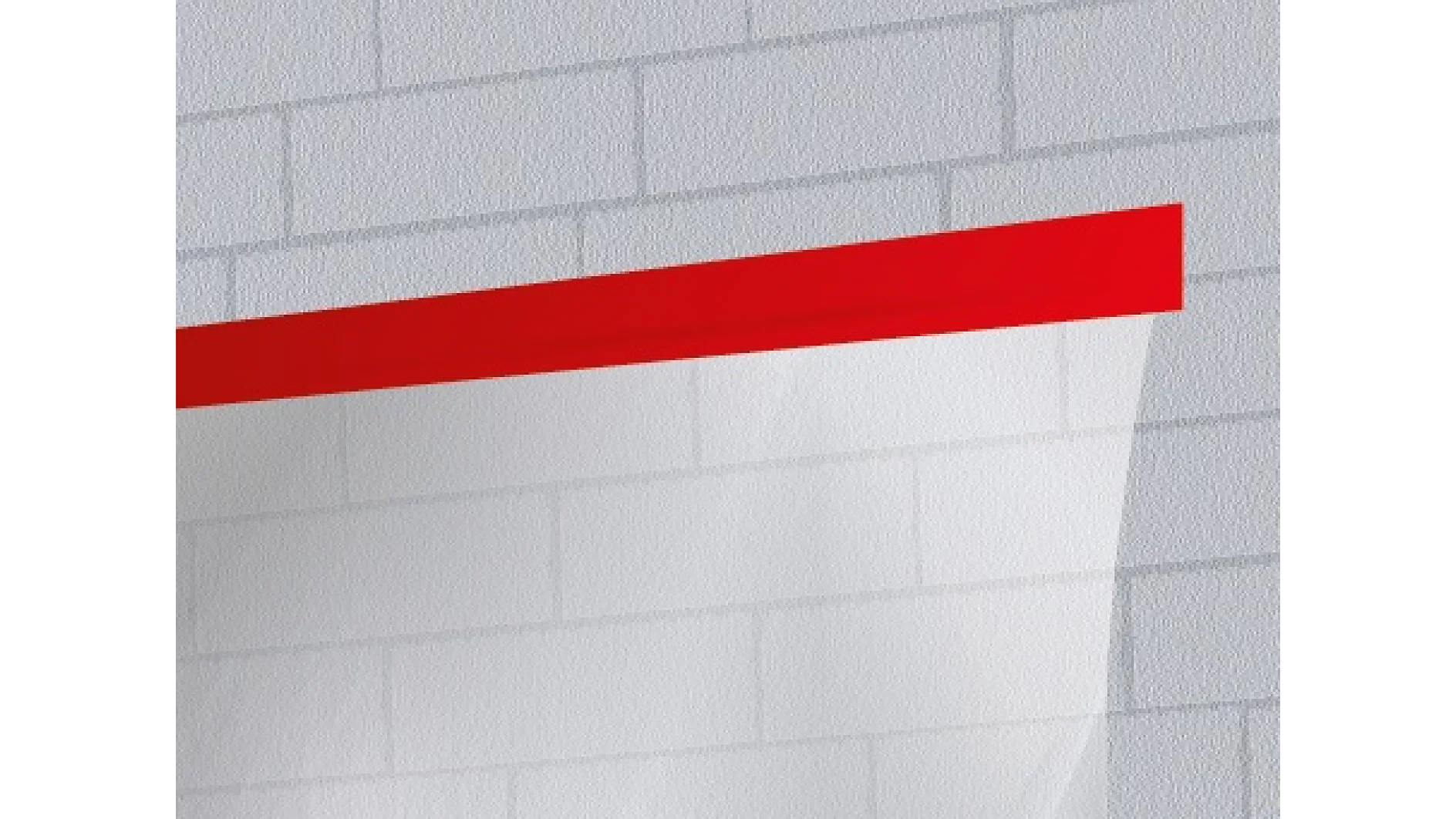 A gray brick wall with a glossy white panel partially covering it. The panel has a prominent horizontal red stripe along its top edge, secured with tesa tape. (This text has been generated by AI)