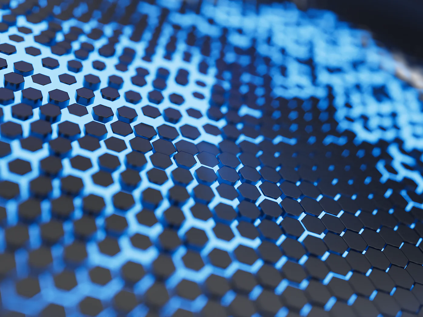 A close-up view of a surface with blue hexagonal patterns, creating a honeycomb effect. The edges are blurred, enhancing depth and texture. The lighting emphasizes the geometric pattern, giving a high-tech appearance. (This text has been generated by AI)